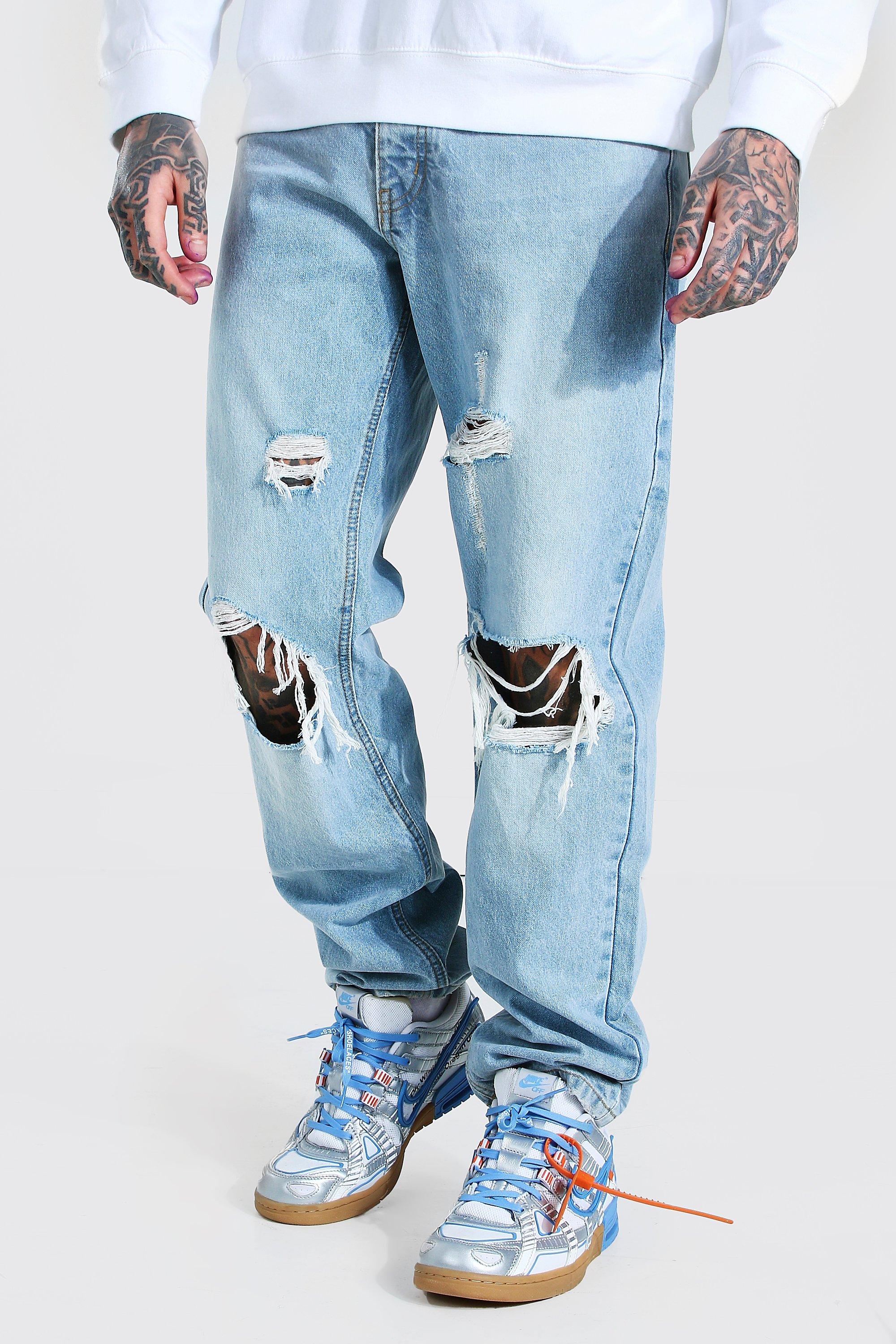 Relaxed Fit Distressed Jeans With Busted Knee