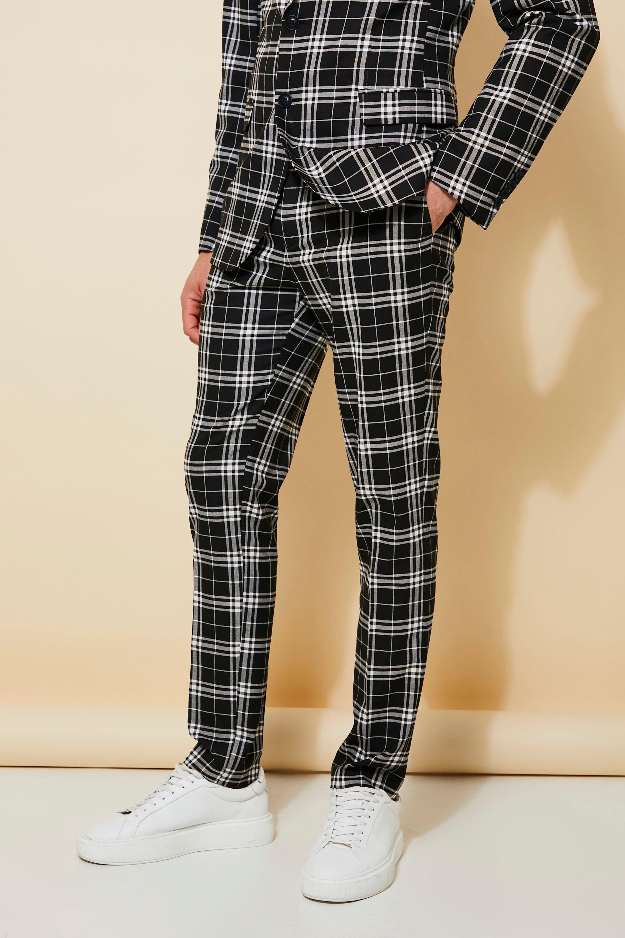 grey check pants with black shirt