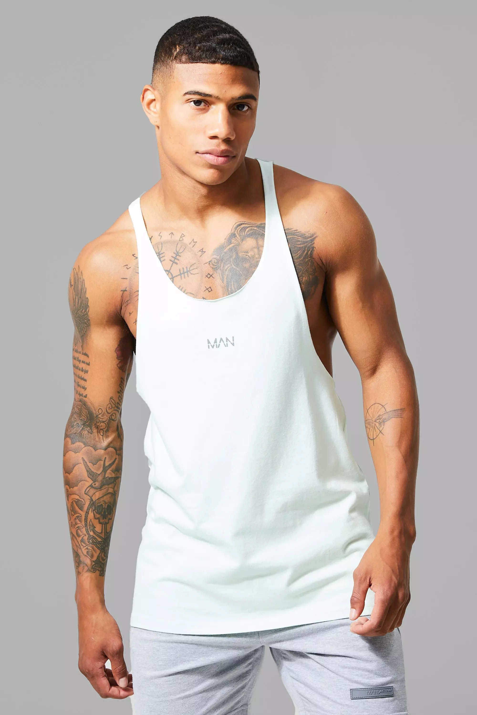 Man Active Raw Edge Stringer Vest boohooMAN IE
