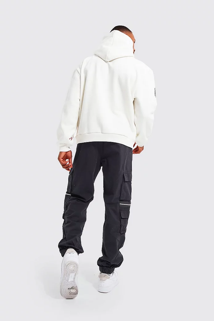 Elasticated Waist Multi Pocket Zip Cargo Pants | boohooMAN USA Elasticated Waist Multi Pocket Zip Cargo Pants | boohooMAN USA