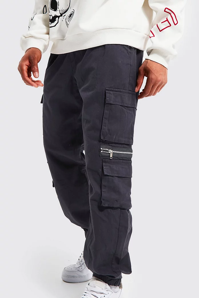 Elasticated Waist Multi Pocket Zip Cargo Pants | boohooMAN USA Elasticated Waist Multi Pocket Zip Cargo Pants | boohooMAN USA