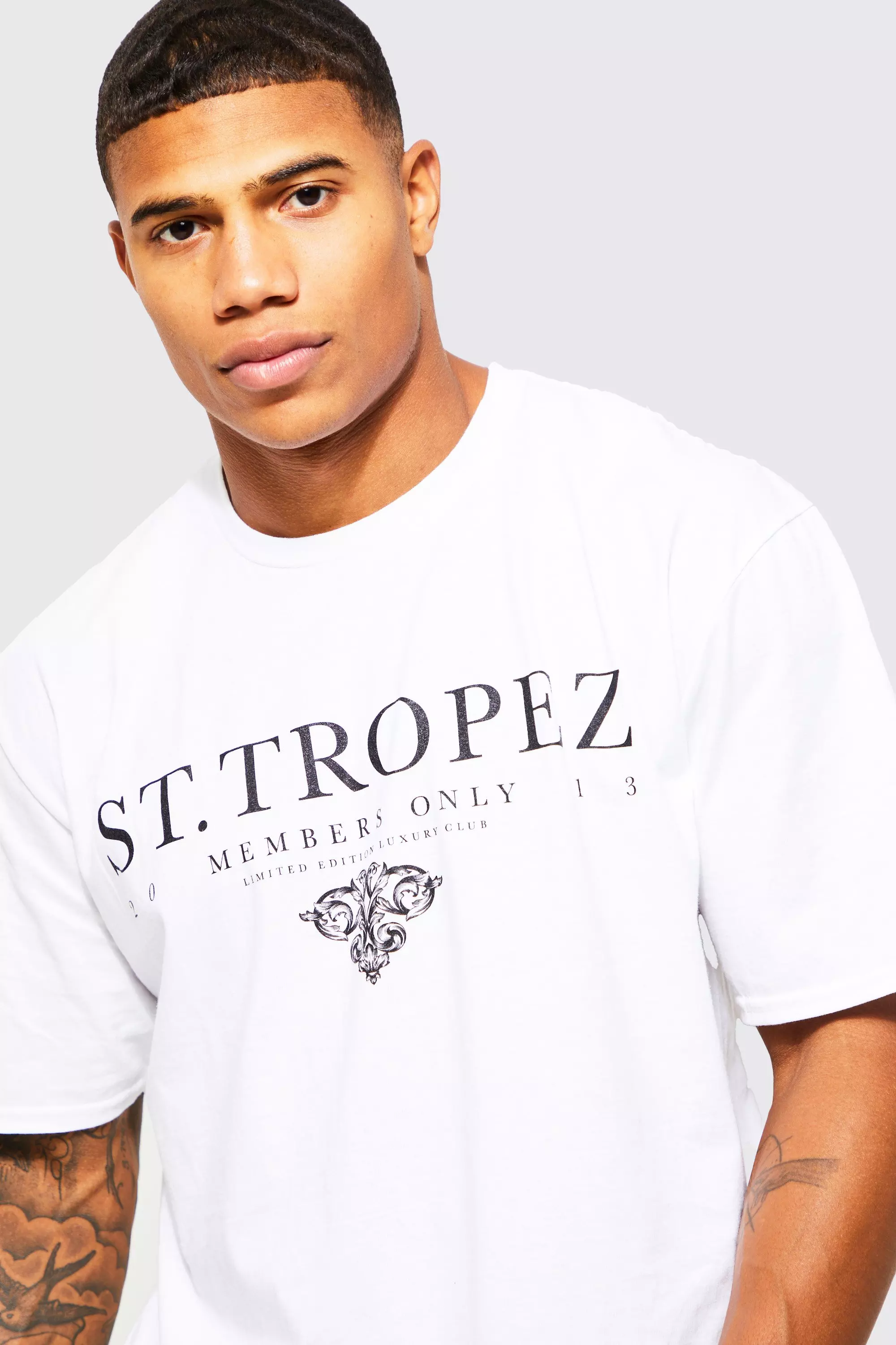 T shirt oversize a slogan St Tropez boohooMAN FR
