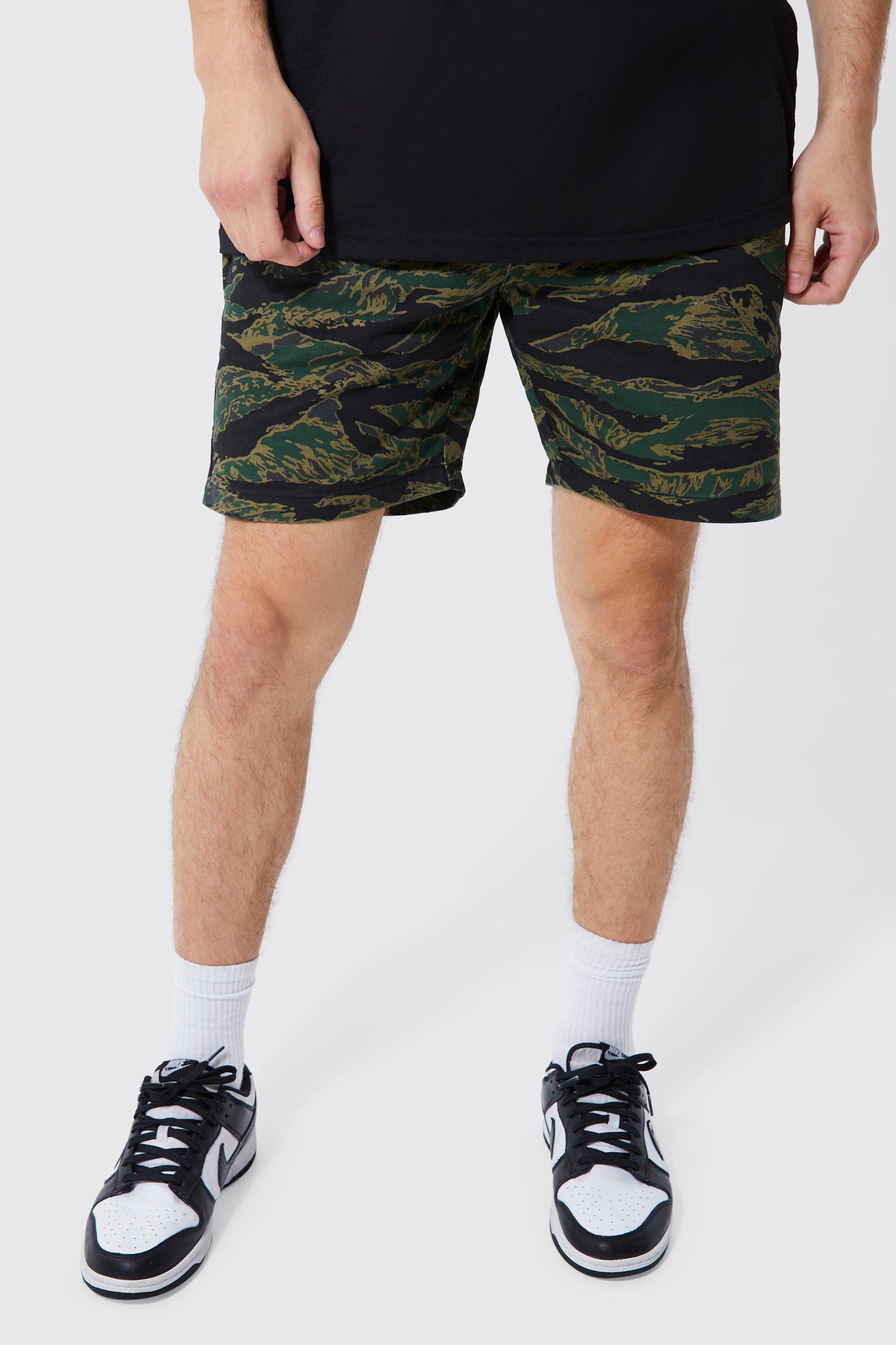 Carhartt wip hot sale camo shorts