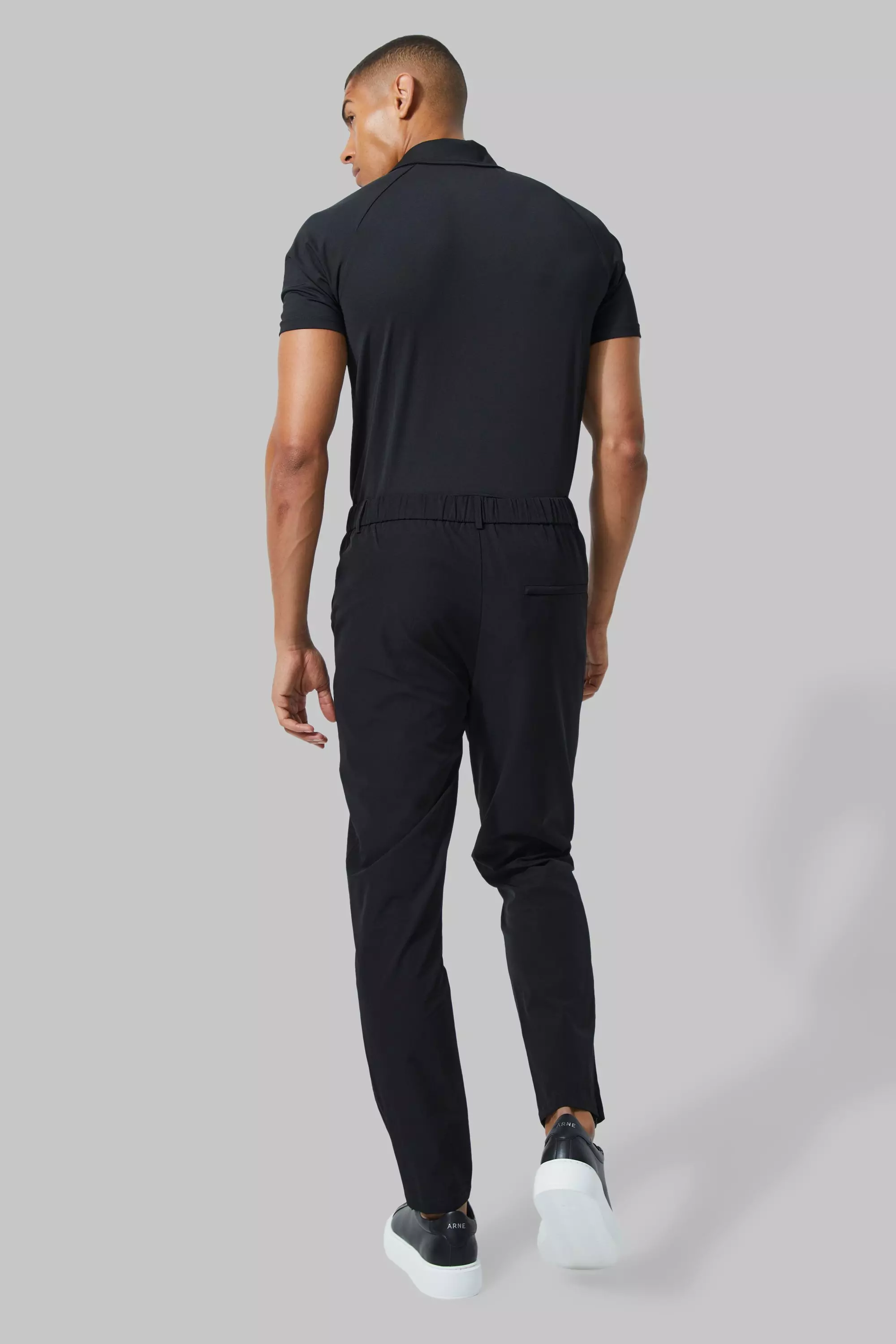 Man Active Golf Poloshirt, Black alternatives Bild