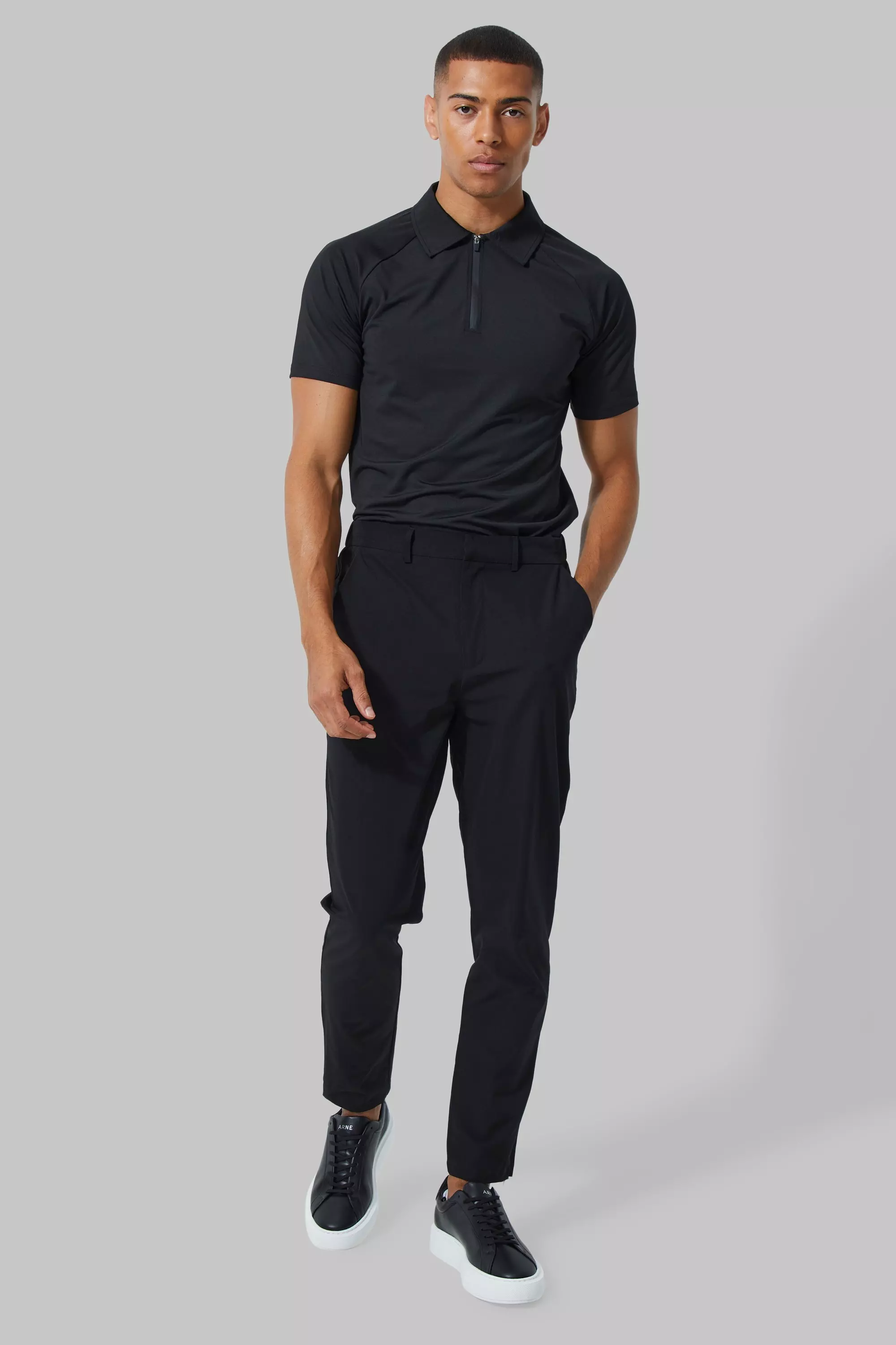 Man Active Golf Poloshirt, Black alternatives Bild