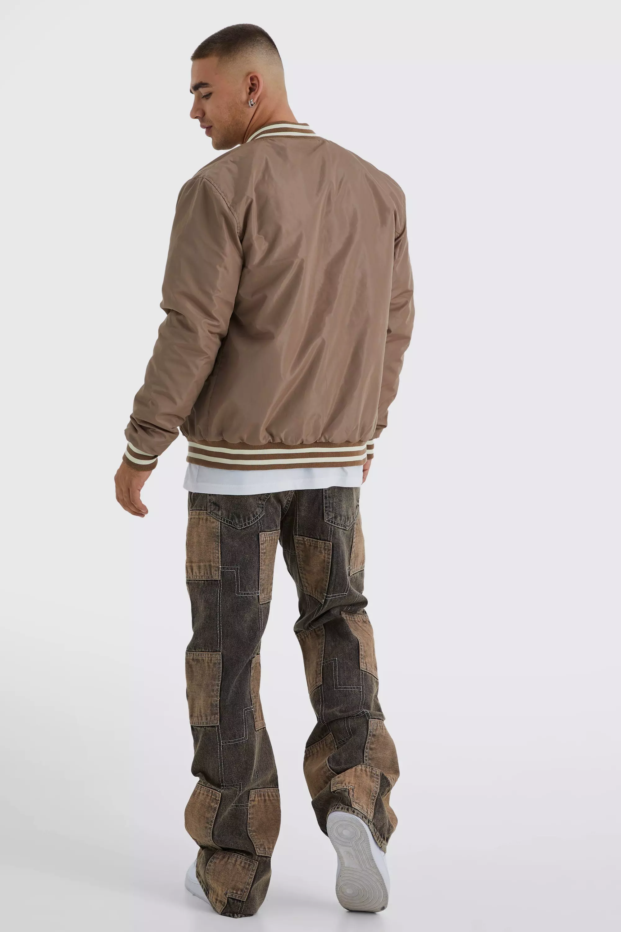 Relaxed Rigid Flare Patchwork Jeans | boohooMAN USA