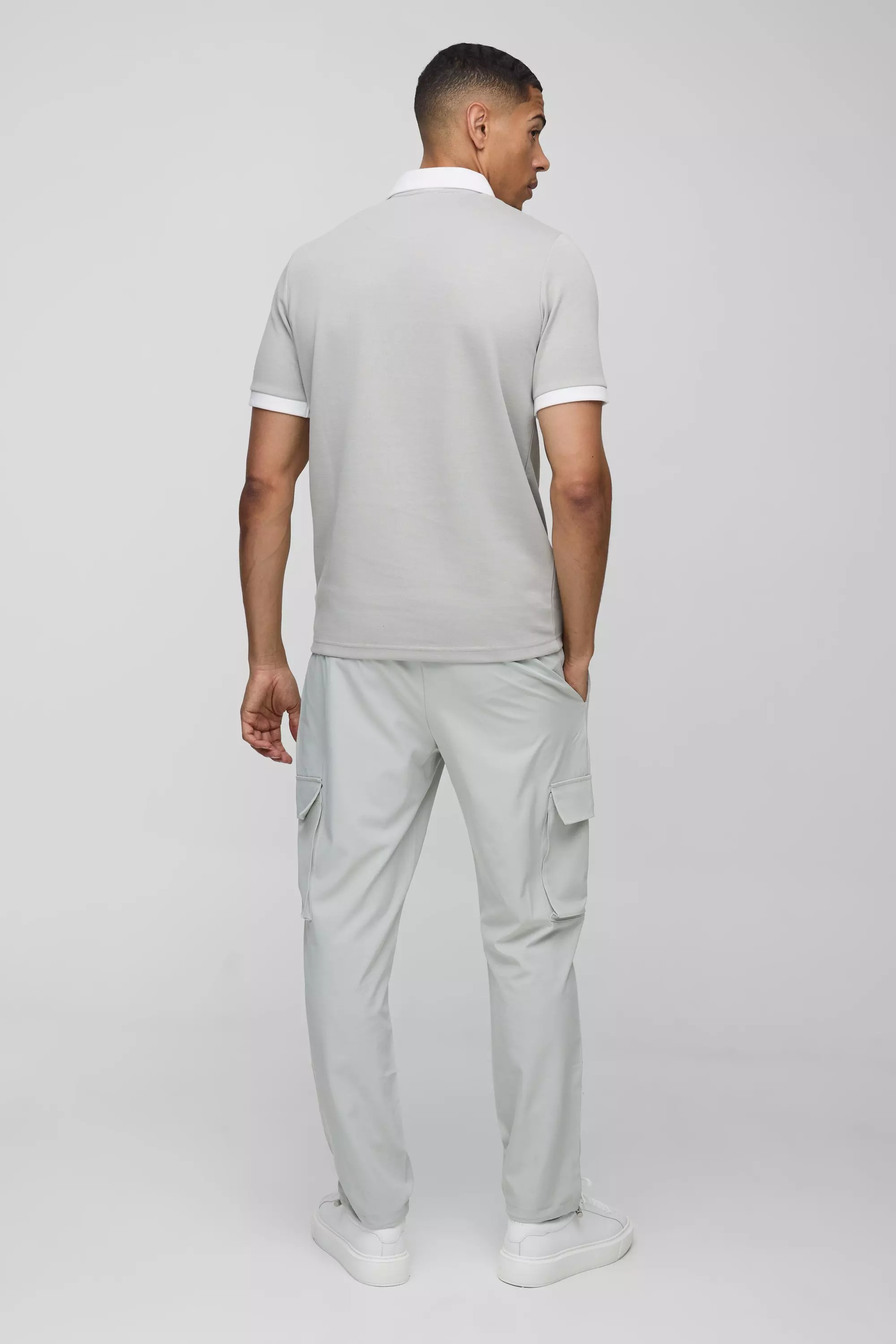 Slim-Fit Poloshirt mit Reißverschluss, White alternatives Bild