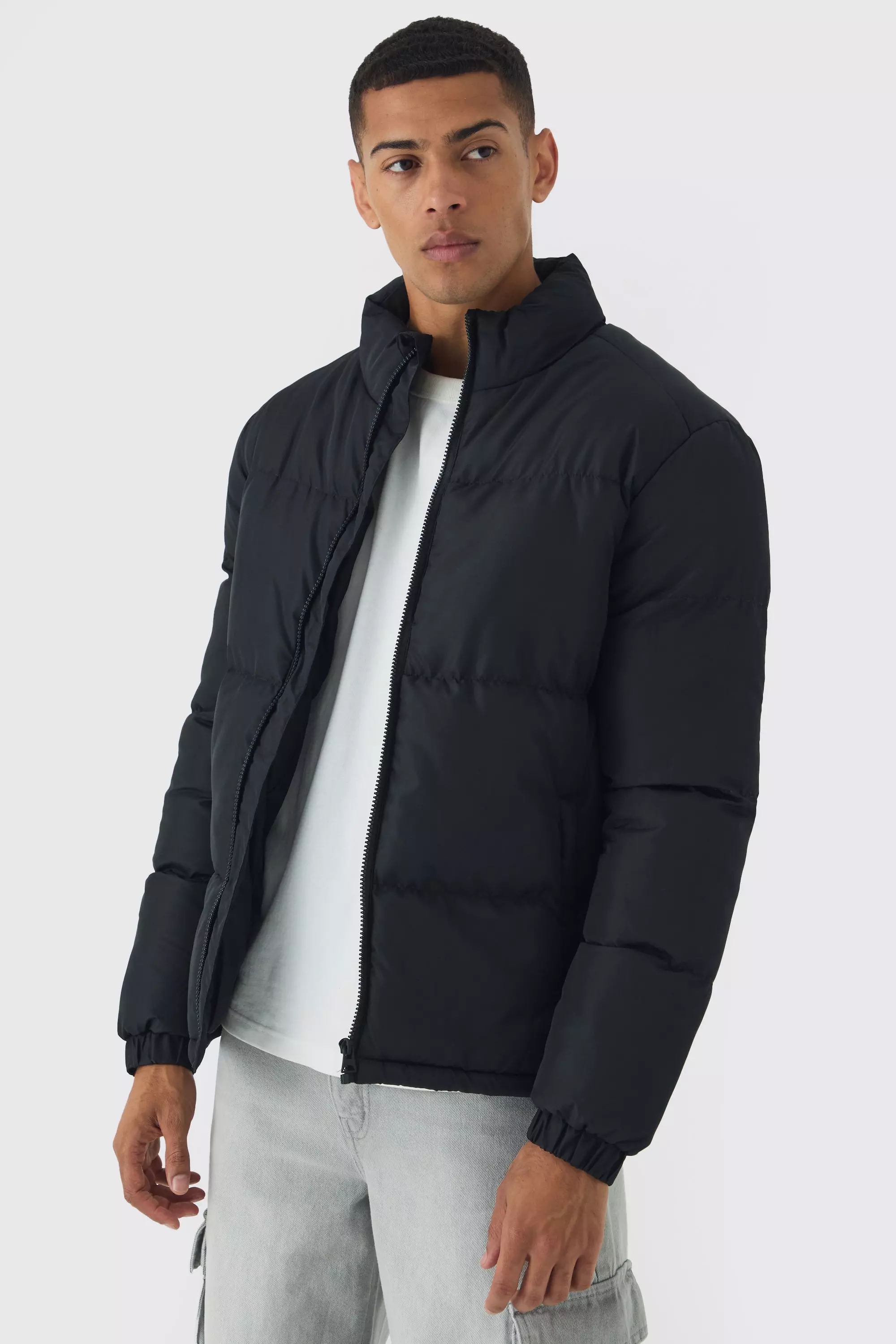 Funnel Neck Puffer Jacket in Black Black