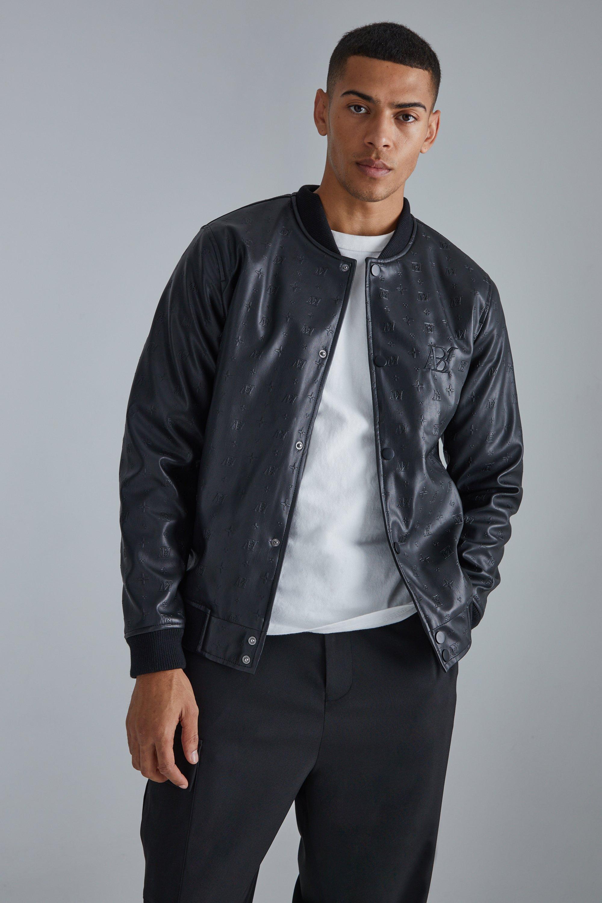 ASOS DESIGN oversized varsity bomber jacket in black with purple badging