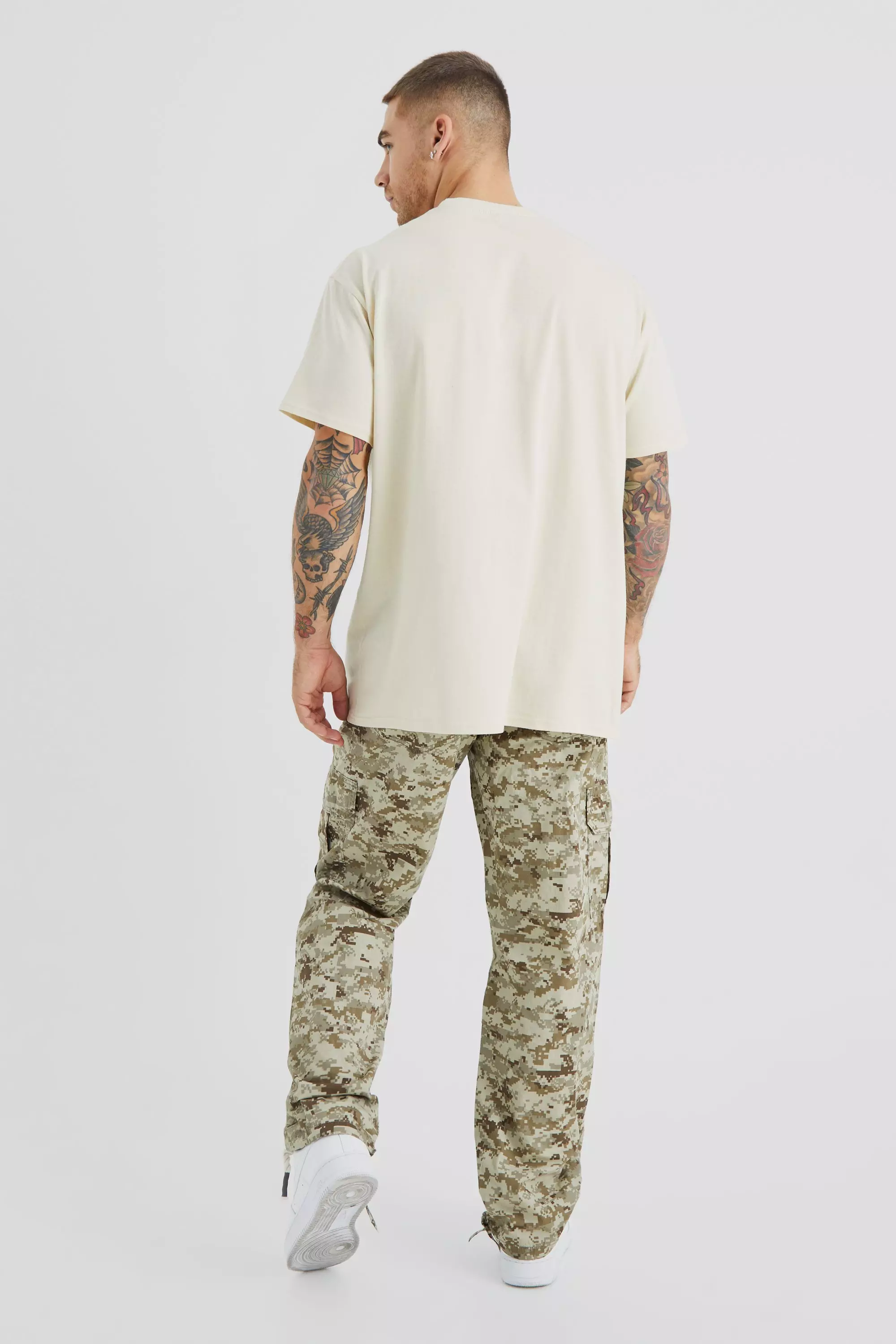 Relaxed Tie Hem Pixilated Camo Cargo Pants | boohooMAN USA