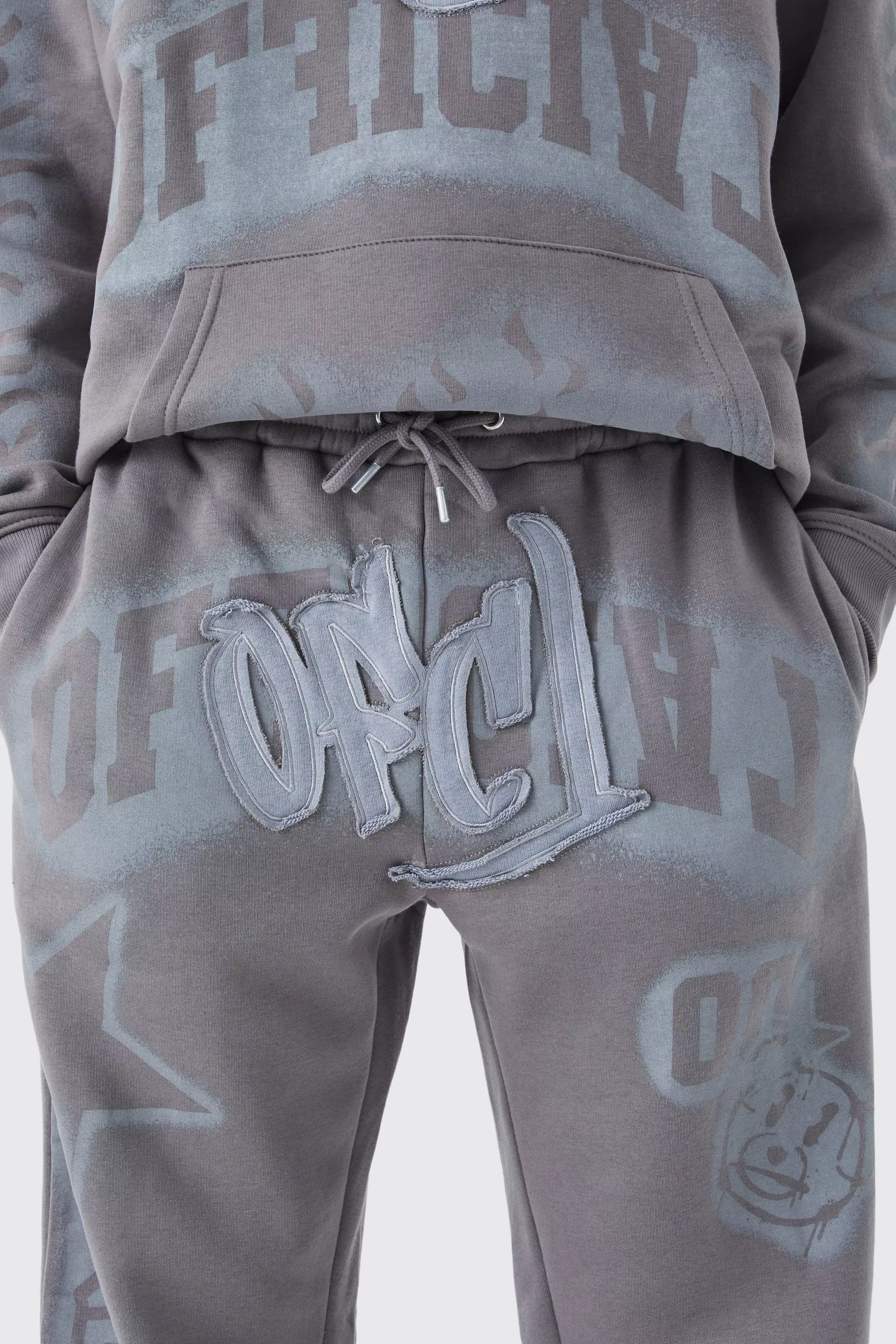 Lockere Jogginghose mit Graffiti-Applikation, Mid grey alternatives Bild