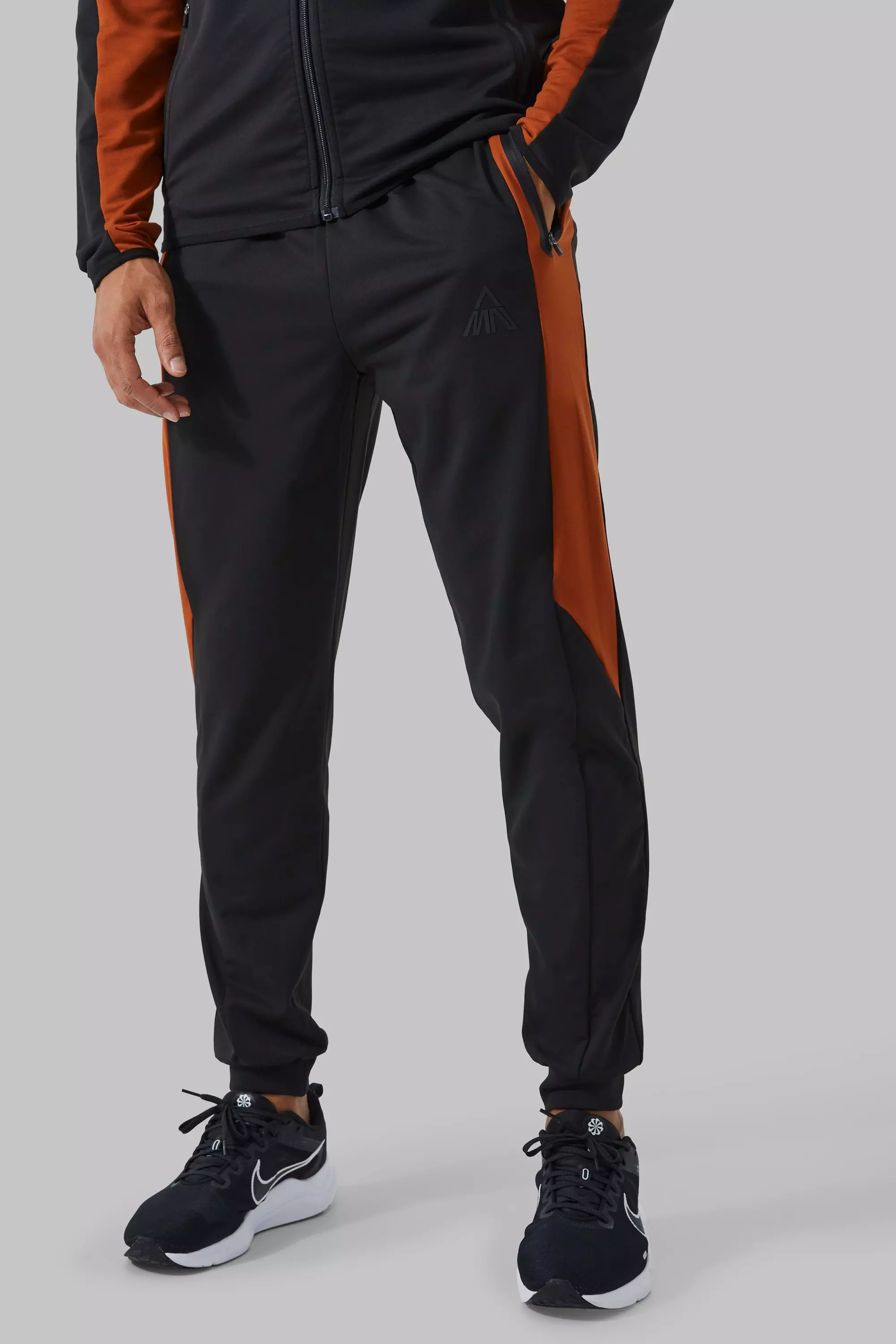 Man Active Colour Block Panelled Sweatpants Burnt orange