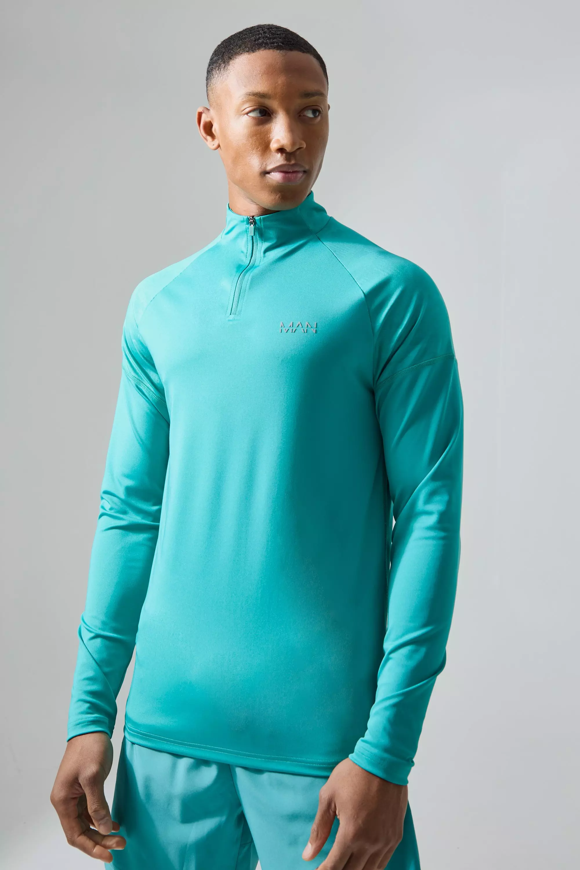 Man Active Camo Raglan 1/4 Zip Teal