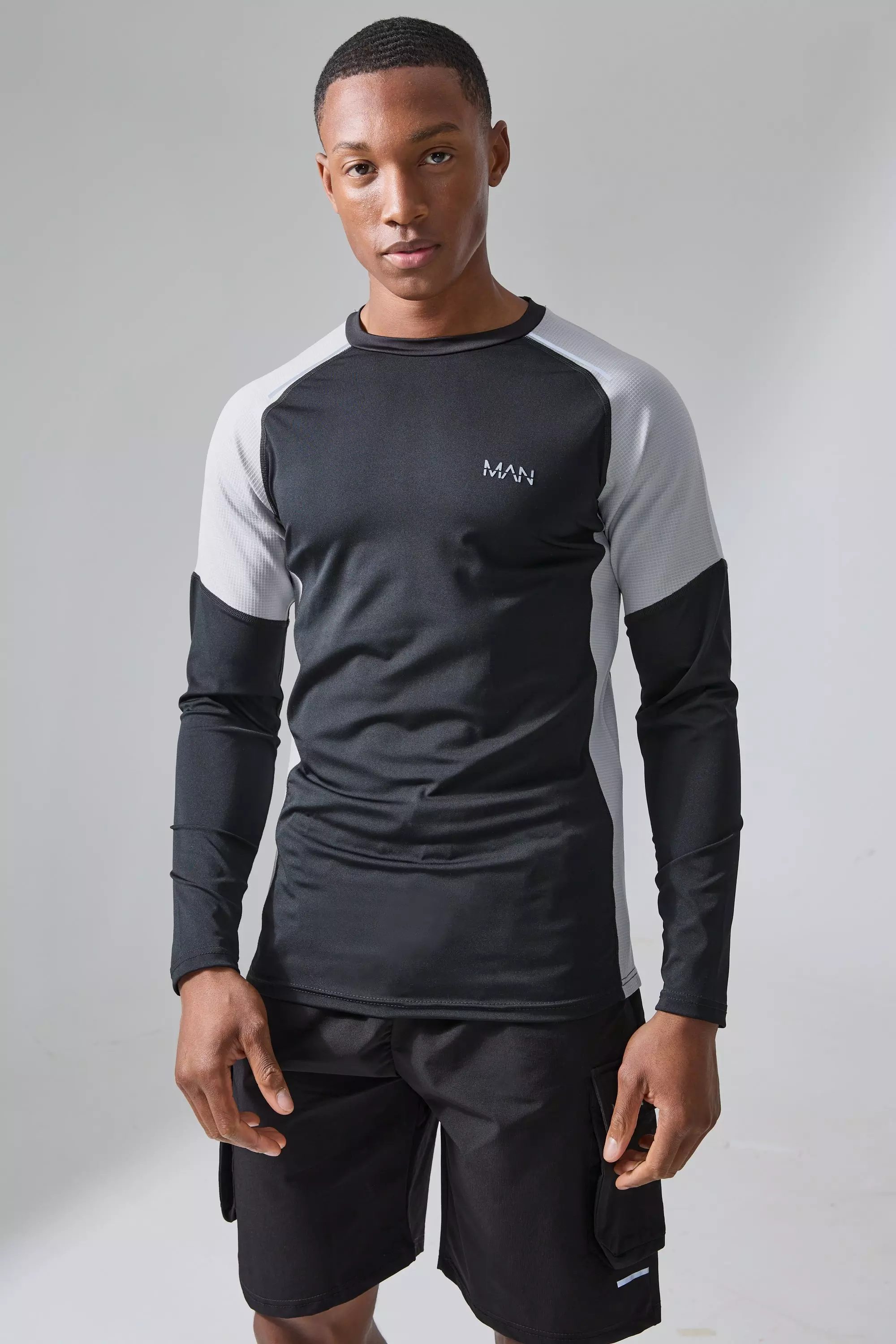Man Active Muscle Fit Textured Base Layer Top Black