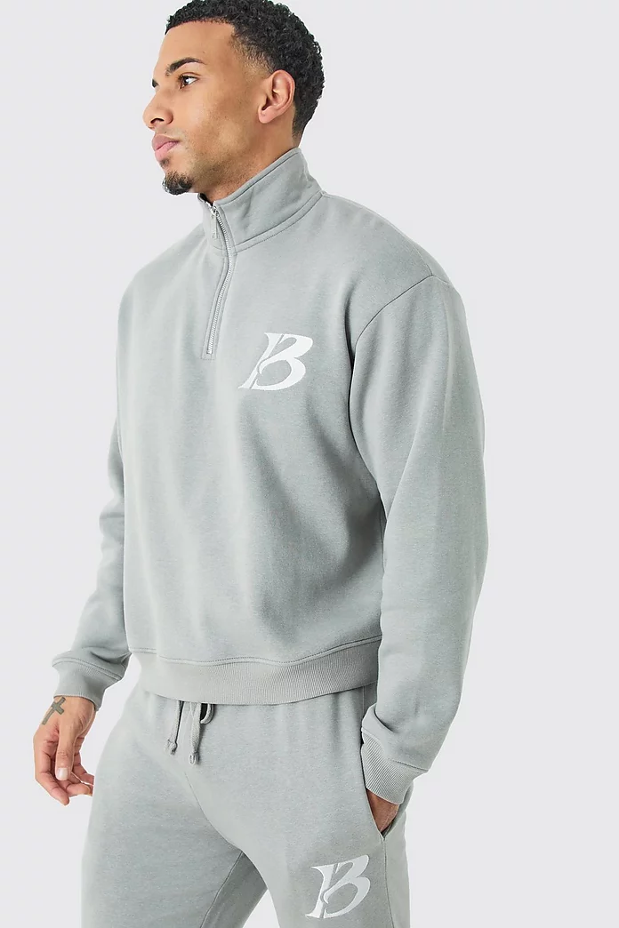 Oversized Boxy B 1/4 Zip Stacked Tracksuit | boohooMAN USA Oversized Boxy B 1/4 Zip Stacked Tracksuit | boohooMAN USA