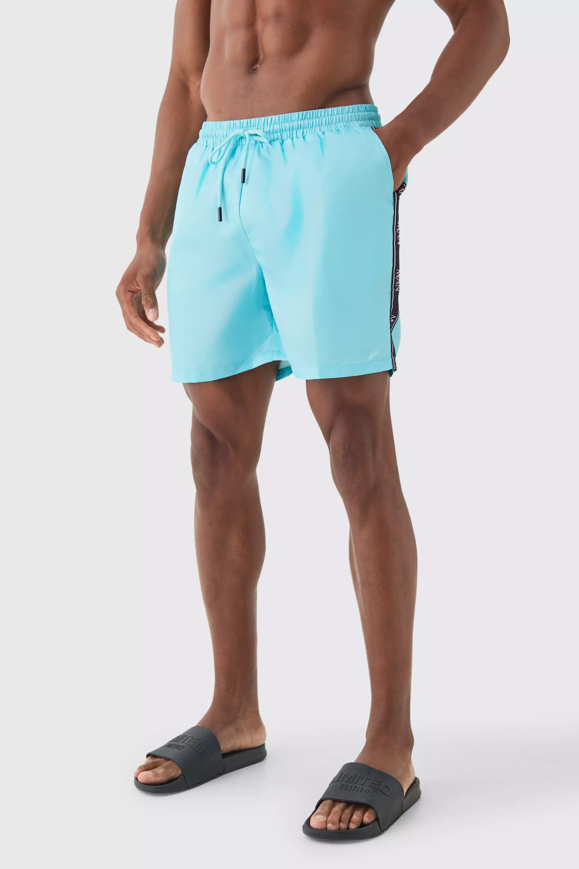 Mid Length Man Tape Swim Shorts Cobalt
