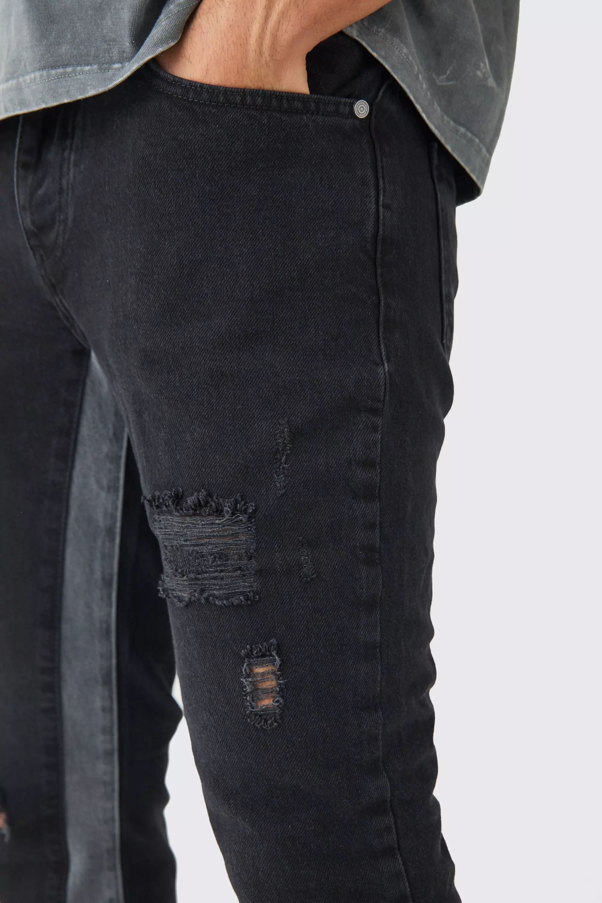 Washed black Slim Fit Flared Jeans Met Versleten Panelen alternatieve afbeelding