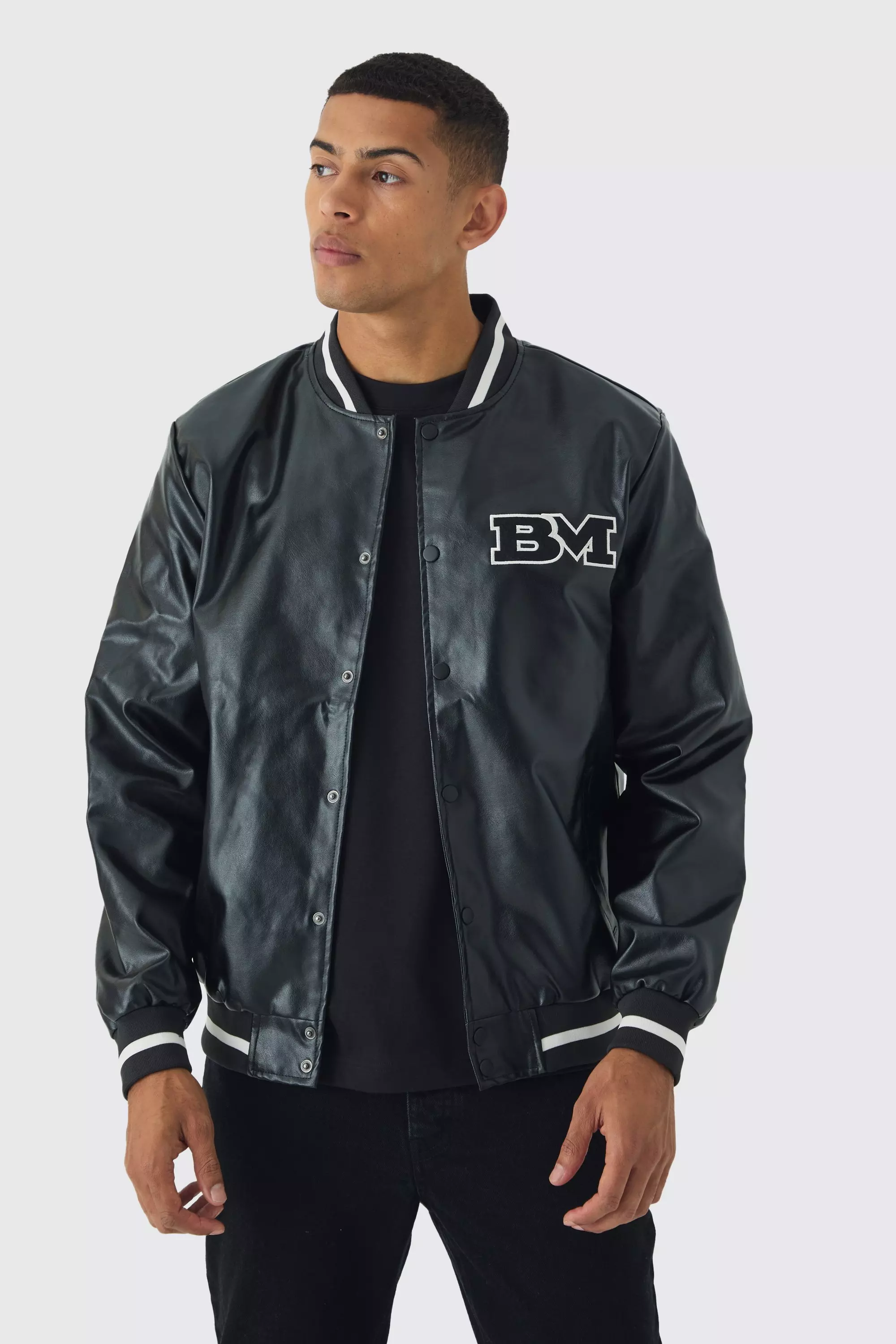 PU Badge Varsity Jacket In Black Black