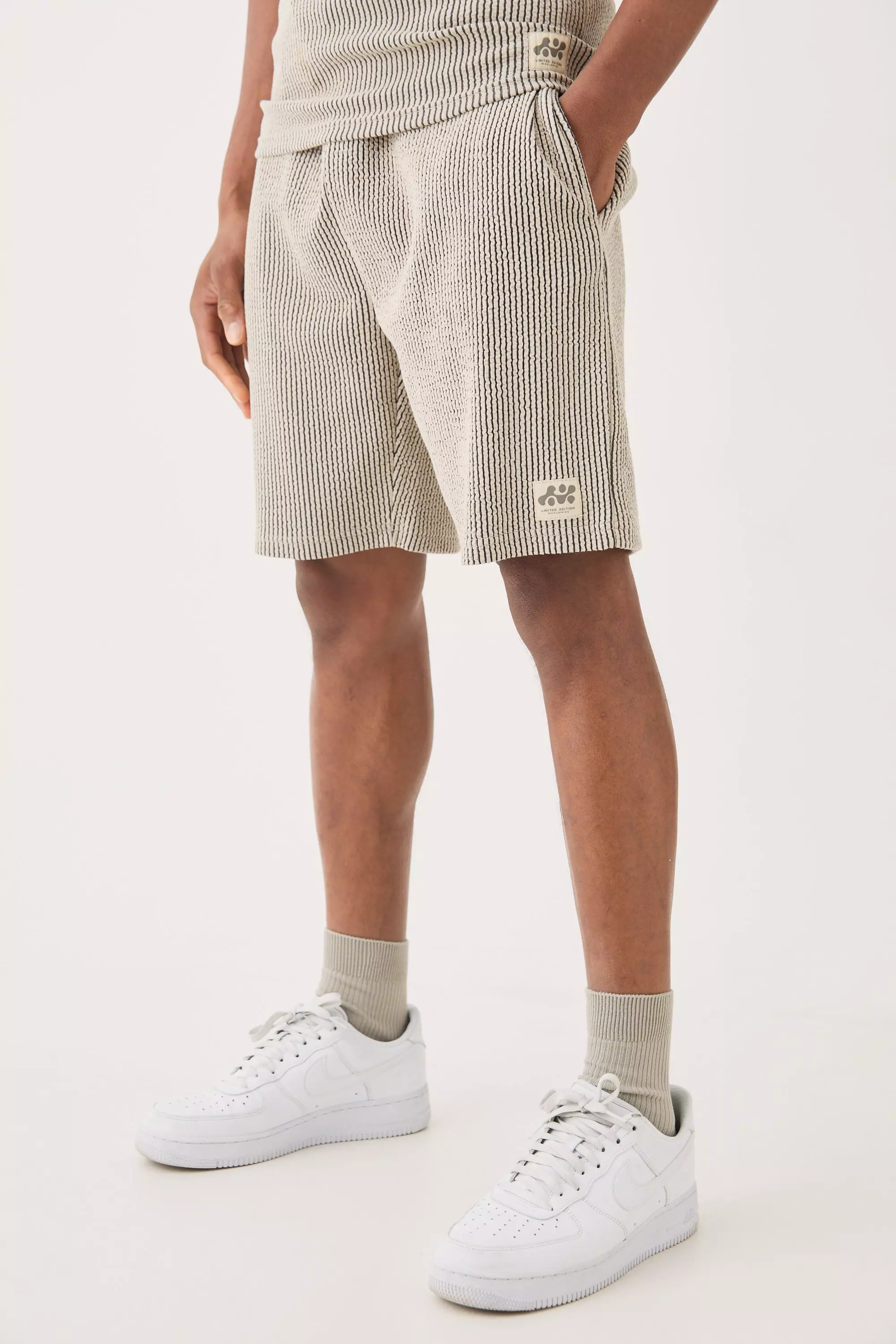 Relaxed Mid Length Textured Short With Woven Tab Grey