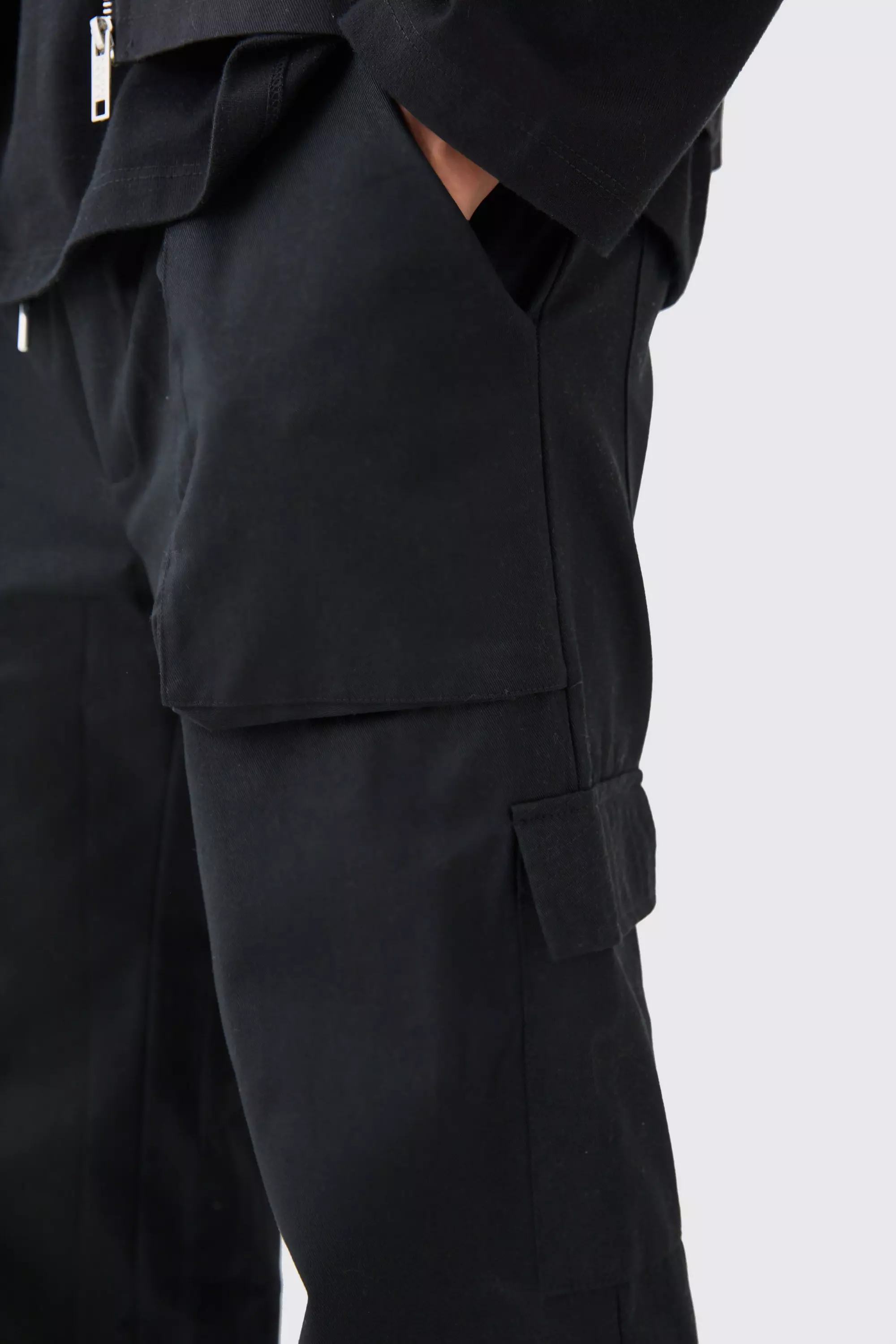 Elasticated Waist Zip Hem Flared Cargo Trousers | boohooMAN USA