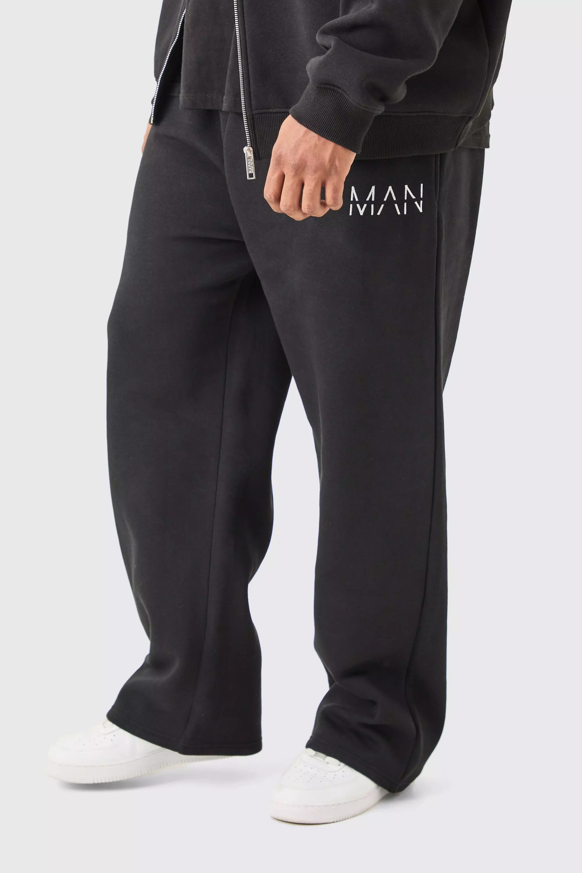 Plus lockere Man-Dash Jogginghose in Schwarz, Black alternatives Bild