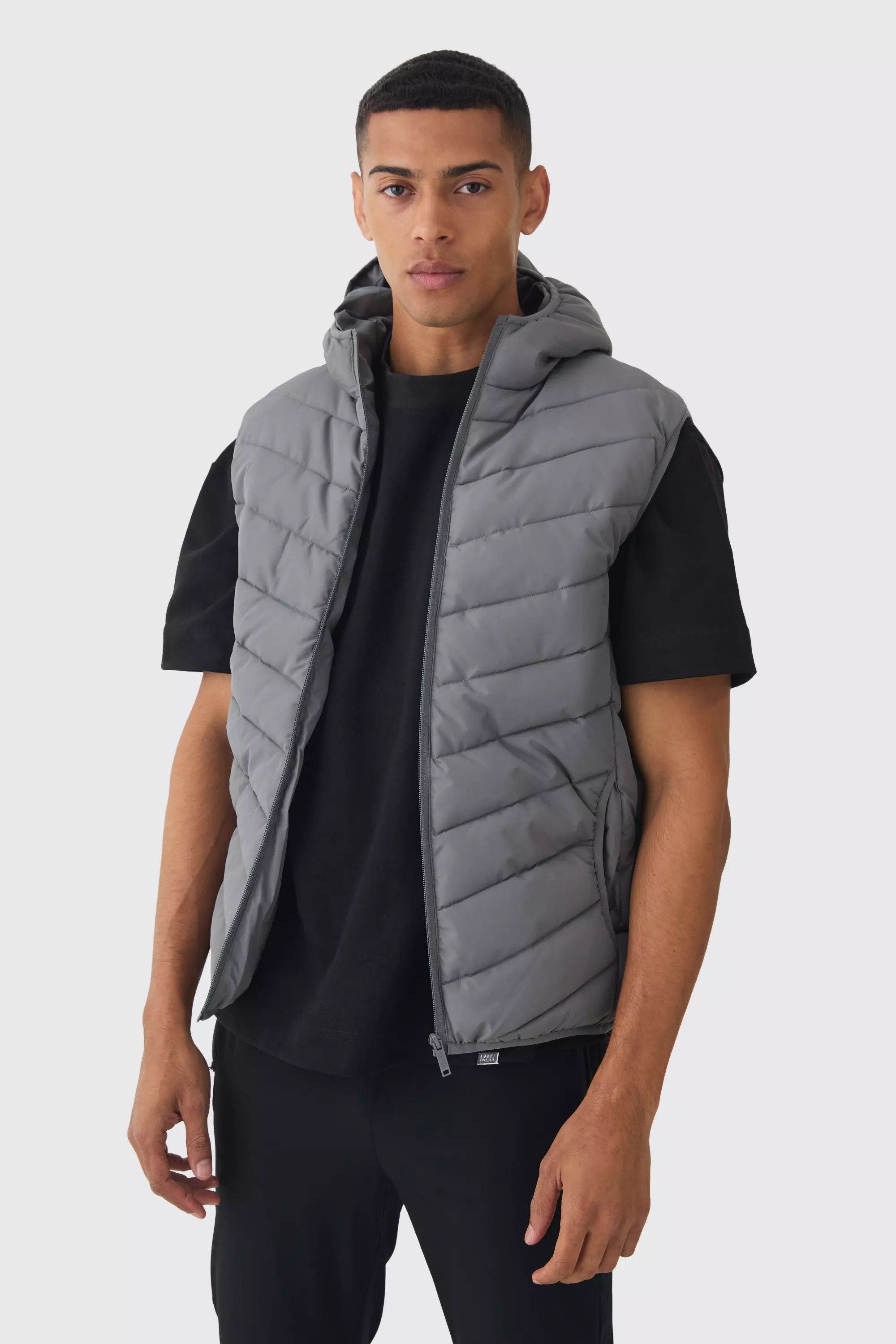 Quilted Zip Through Hooded Vest In Charcoal Charcoal