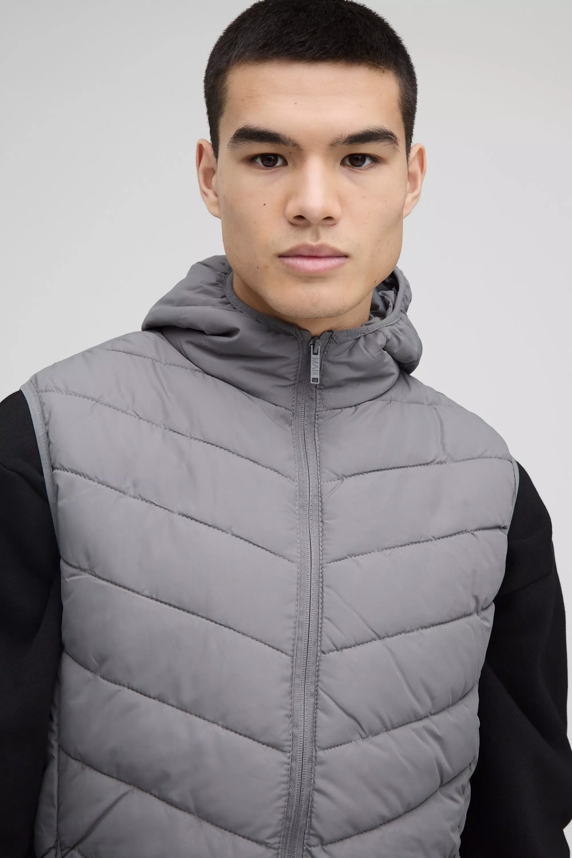 Quilted Zip Through Hooded Gilet In Charcoal alternative image