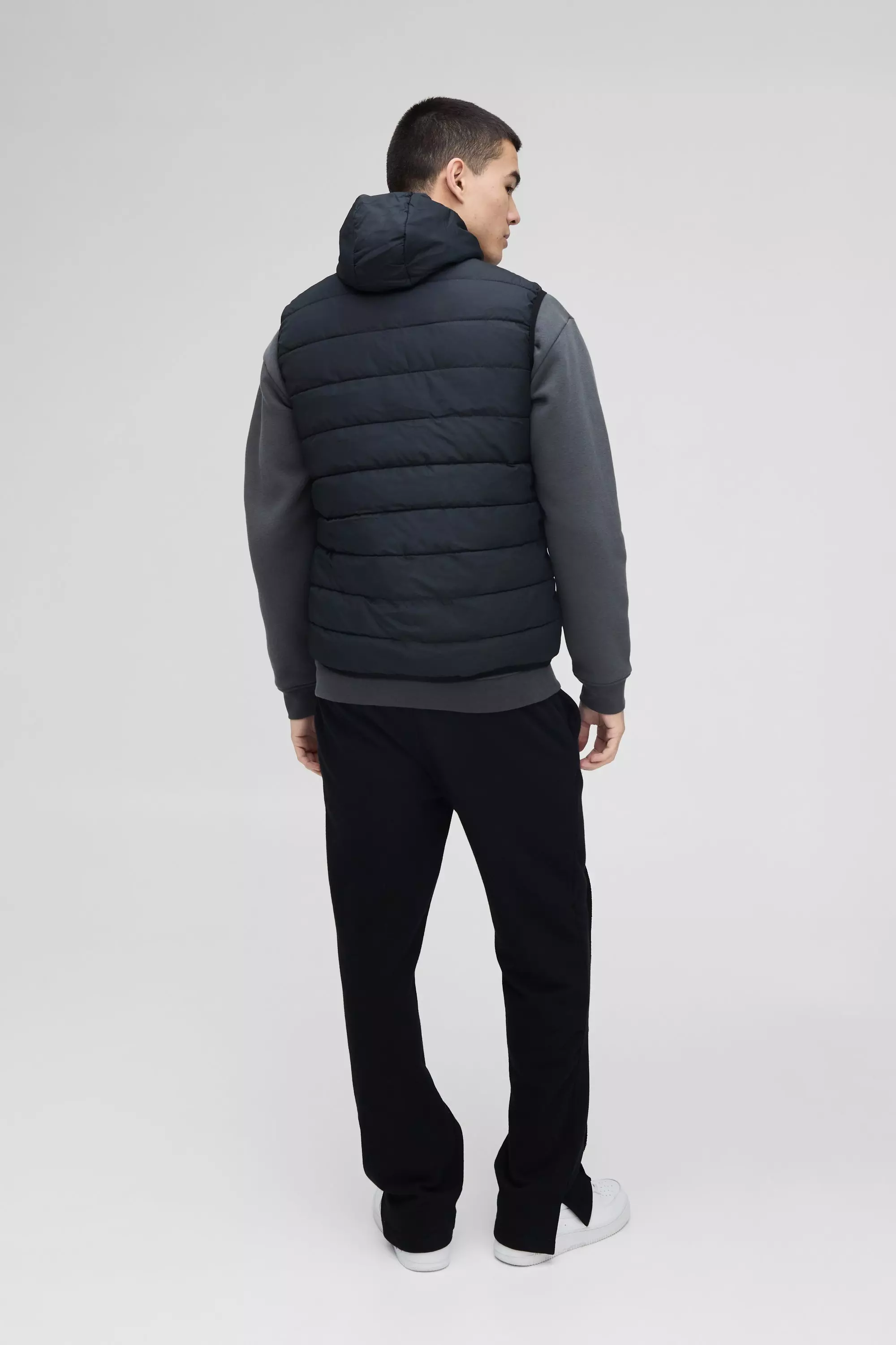 Quilted Zip Through Hooded Gilet In Black alternative image