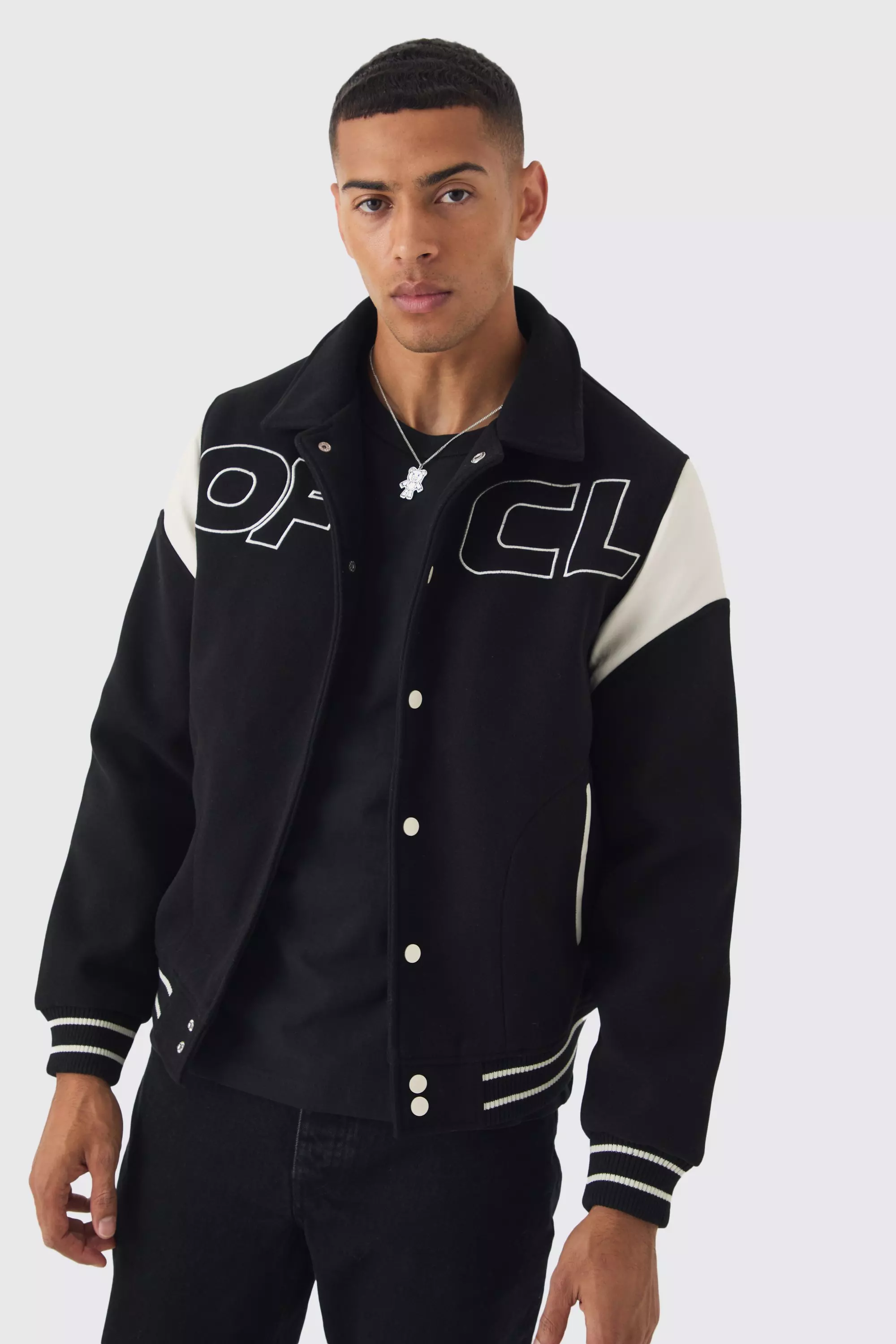 OFCL Collared Varsity Jacket In Black Black