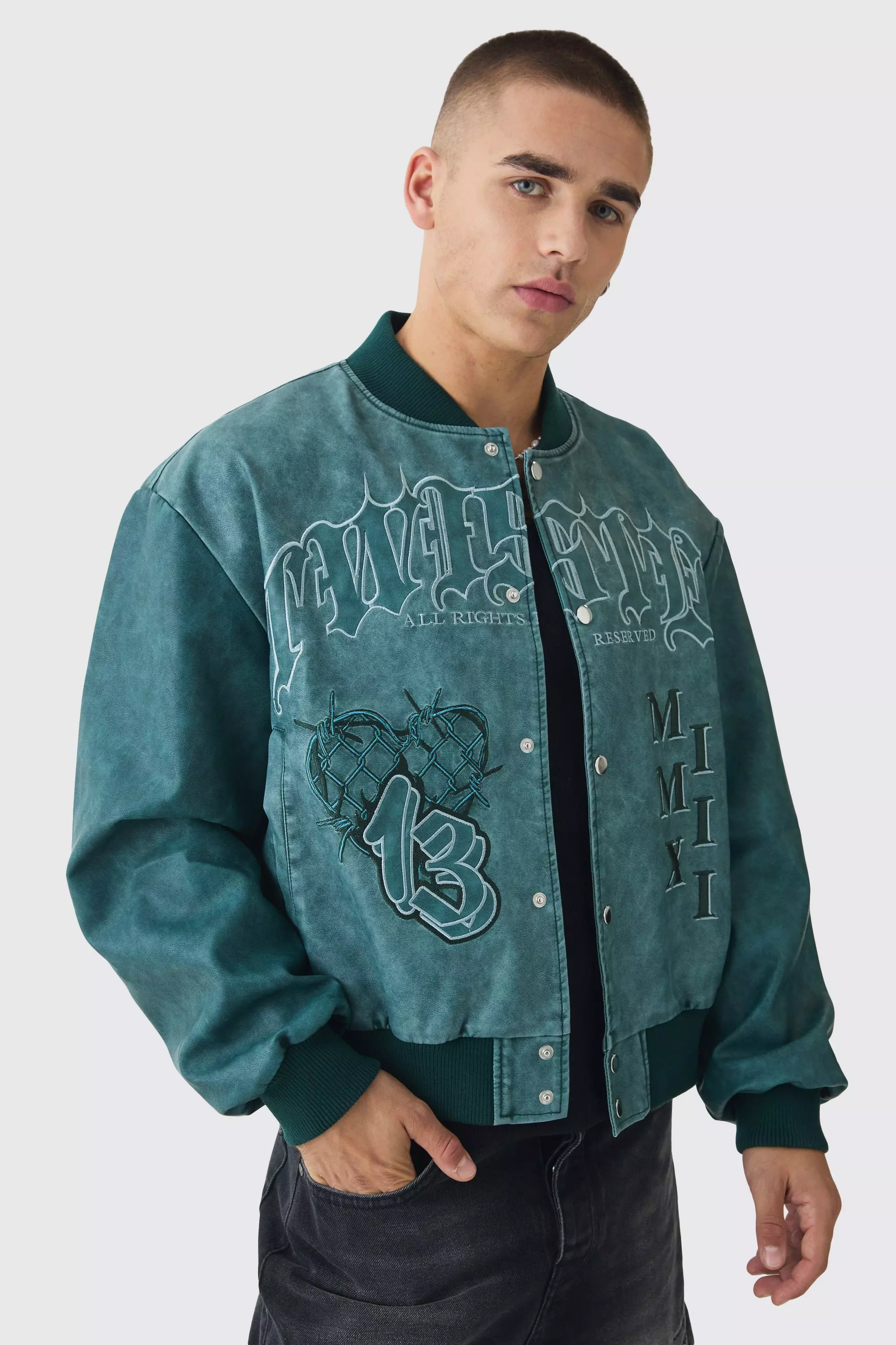 Boxy Tonal Badge Tumbled Pu Varsity Jacket In Blue Blue