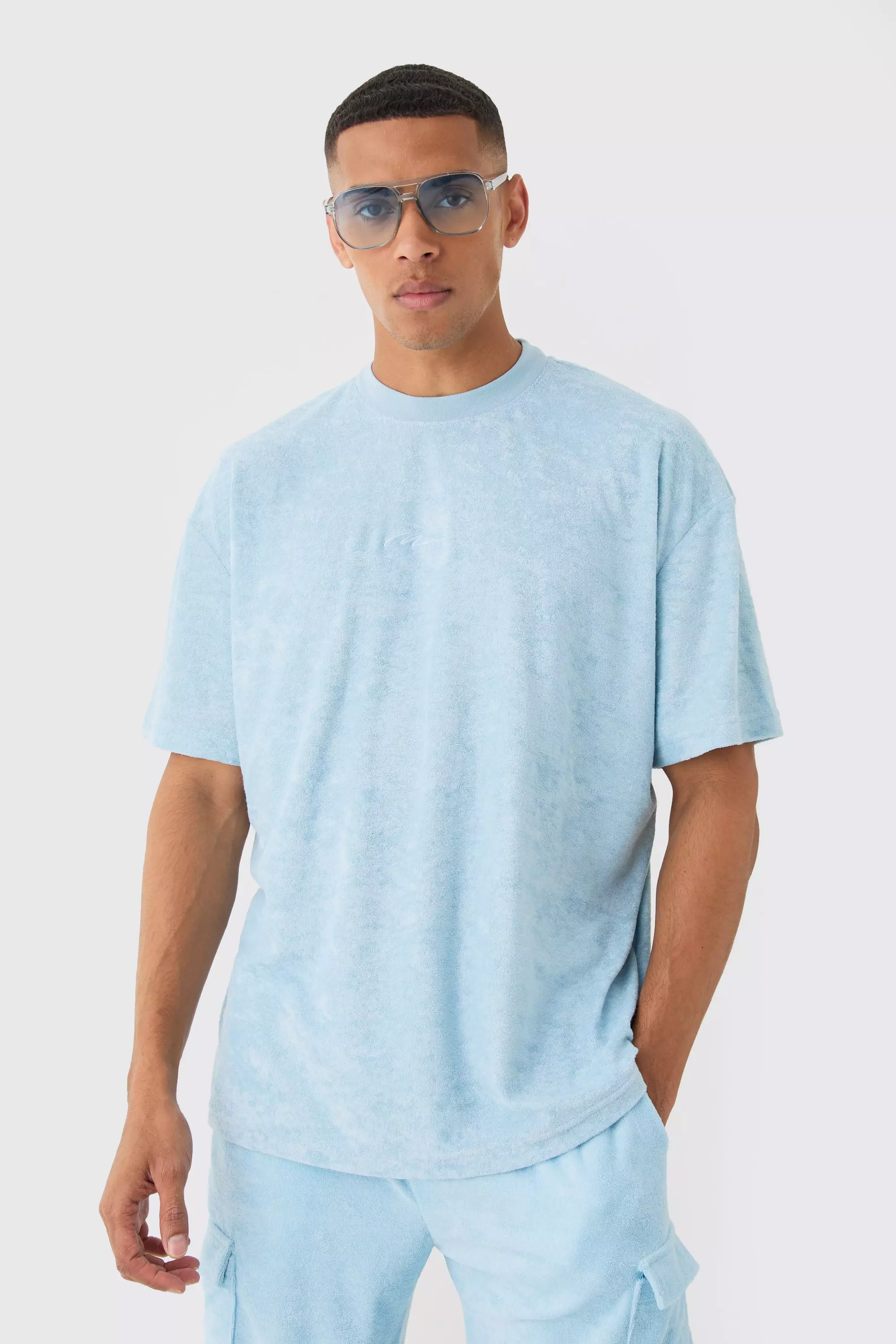Oversized Extended Neck Towelling Man Signature T-shirt Light blue