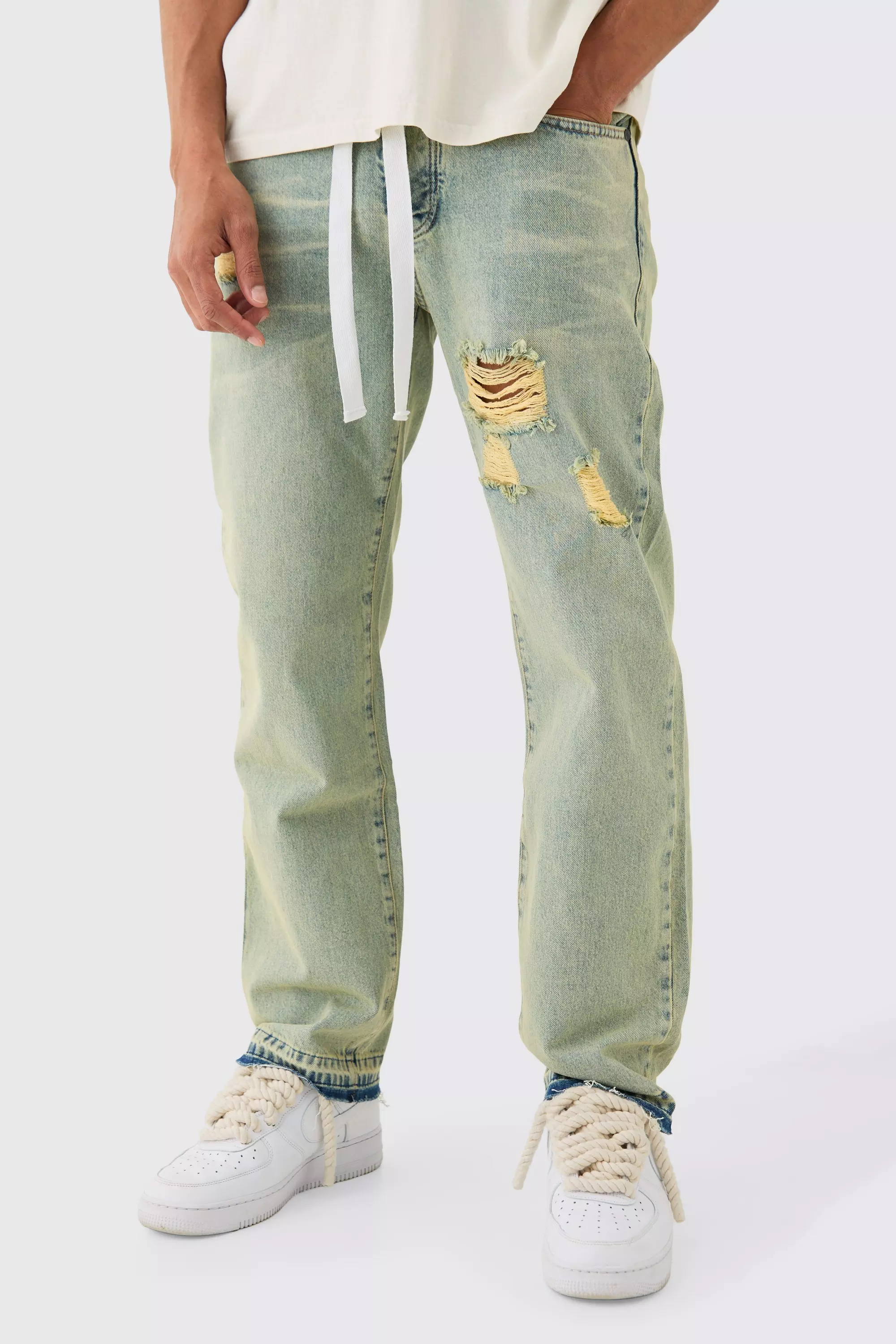 Green Relaxed Rigid Ripped Let Down Hem Jeans With Extended Drawcords In Green Wash