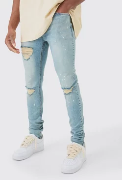 Blue Skinny Stretch Stacked Ripped Paint Splatter Jeans In Ice Blue