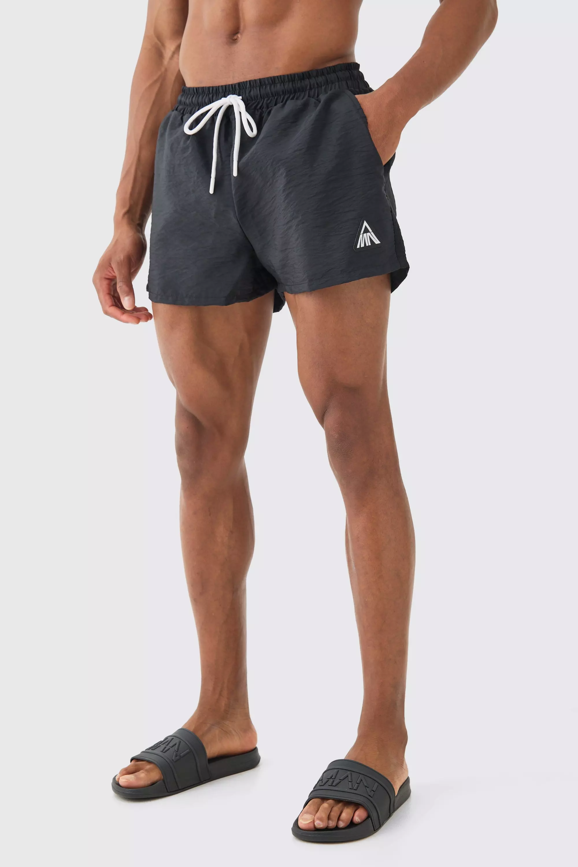 Black Super Short Man Triangle Crinkle Swim Trunks alternative image