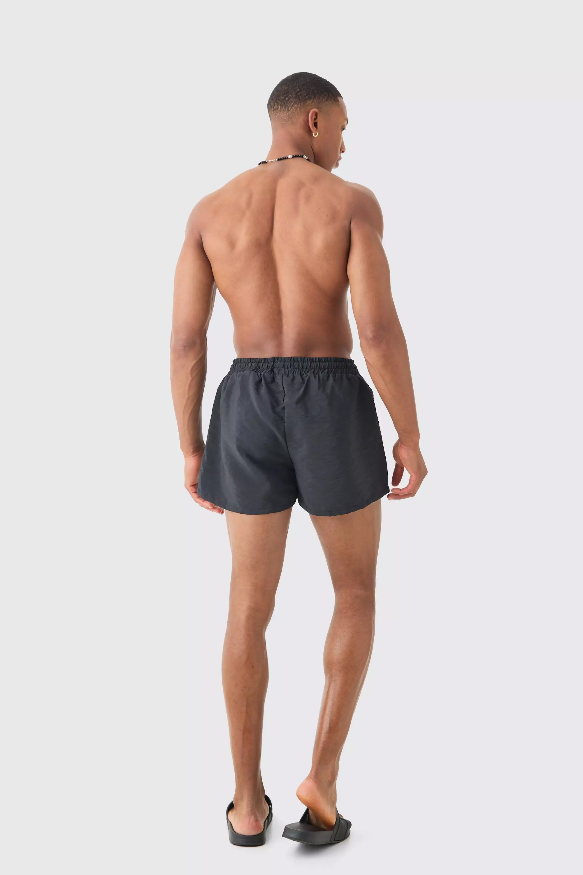 Black Super Short Man Triangle Crinkle Swim Trunks alternative image