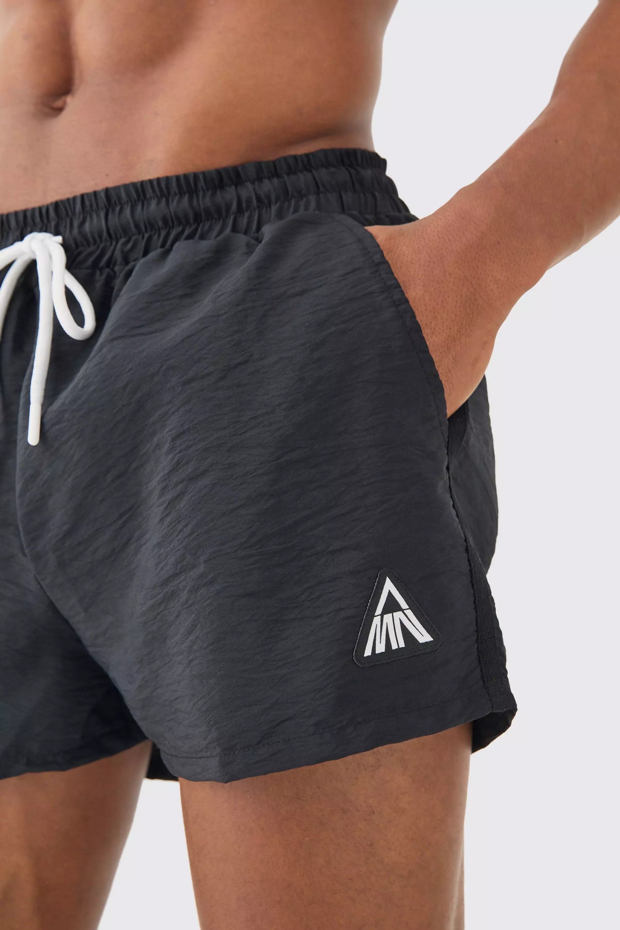 Black Super Short Man Triangle Crinkle Swim Trunks alternative image