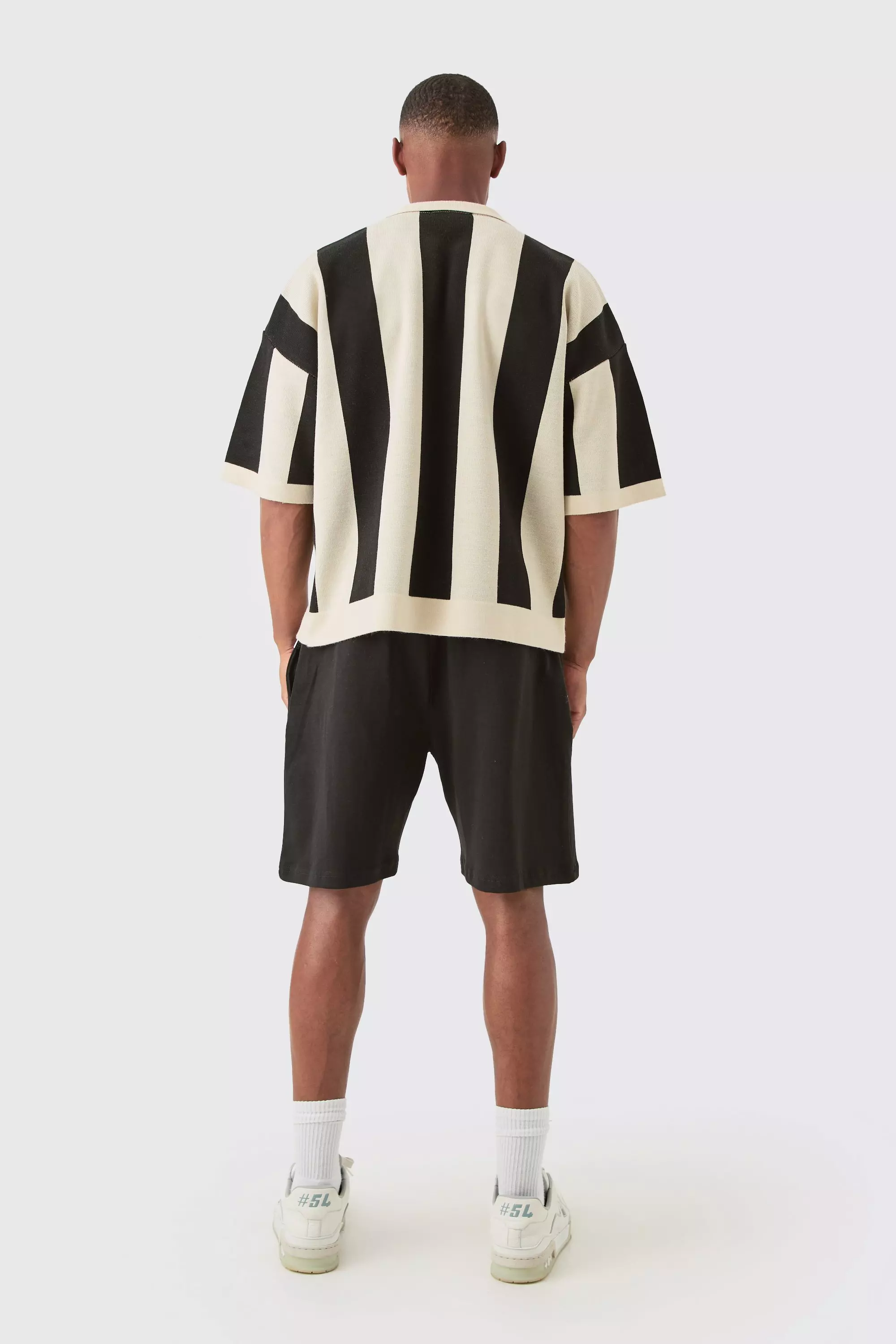 Kastiges Strick-Poloshirt mit Streifen, Black alternatives Bild