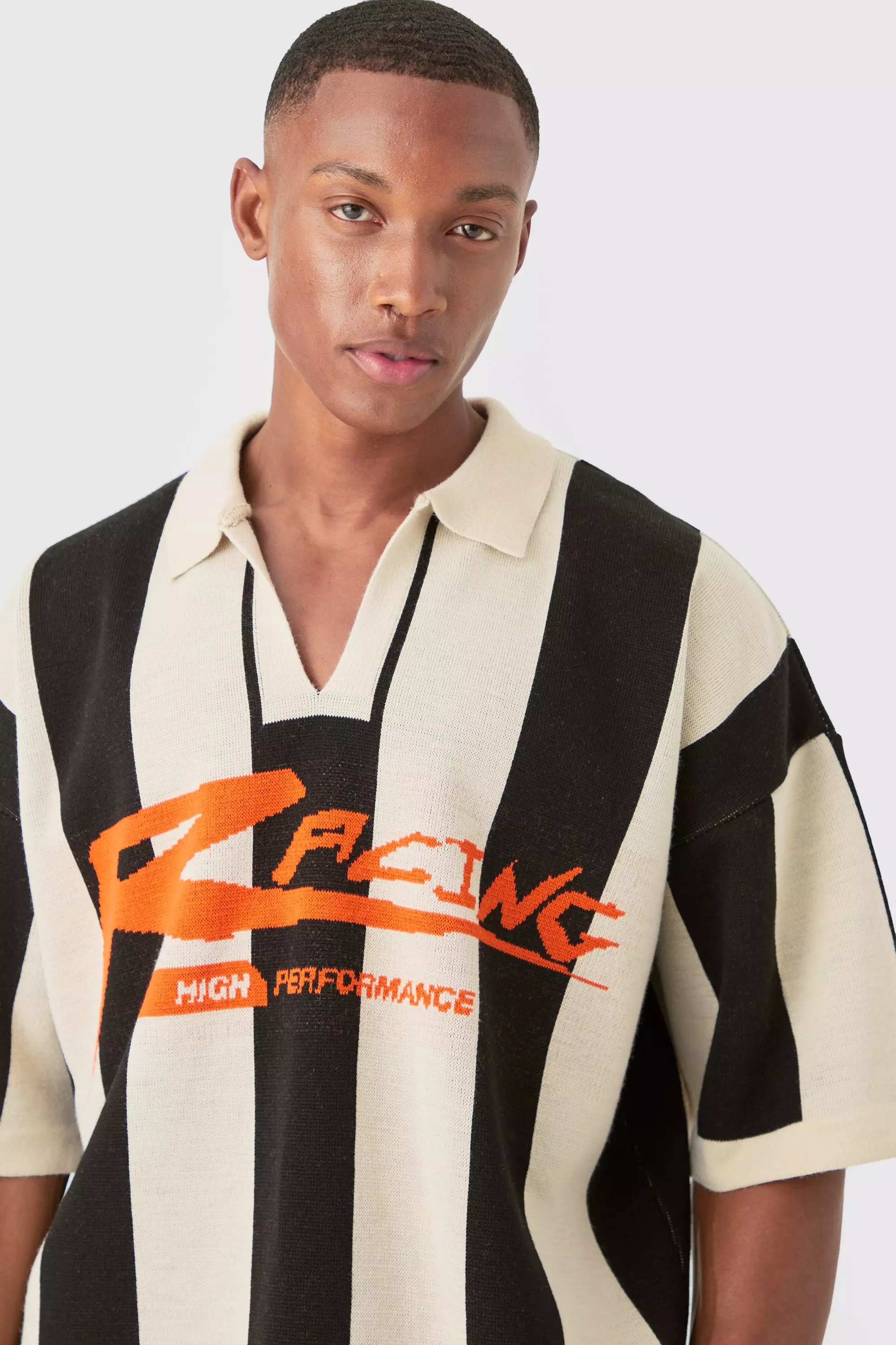 Kastiges Strick-Poloshirt mit Streifen, Black alternatives Bild