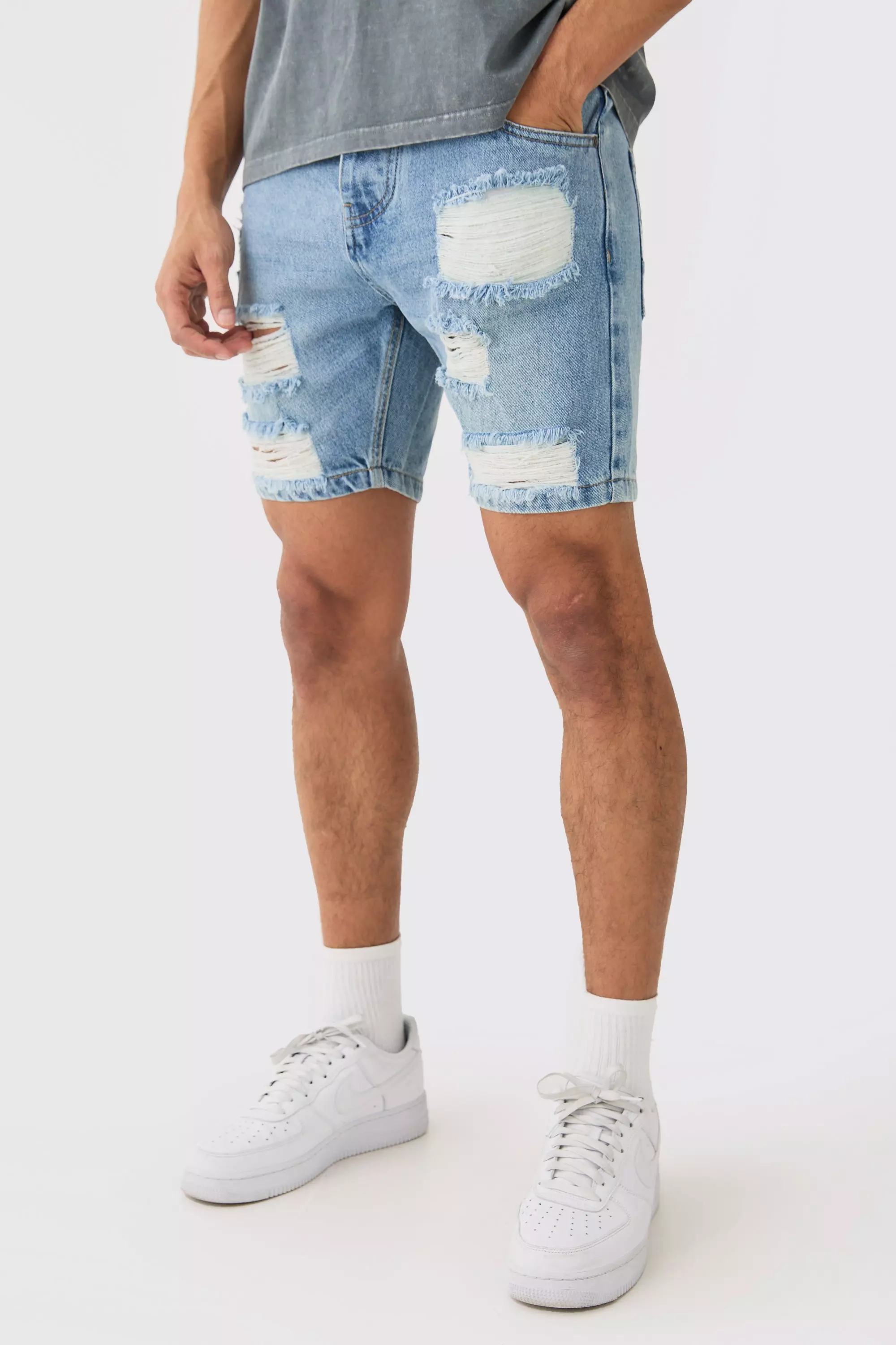 Brown Slim Fit Ripped Denim Shorts In Light Blue