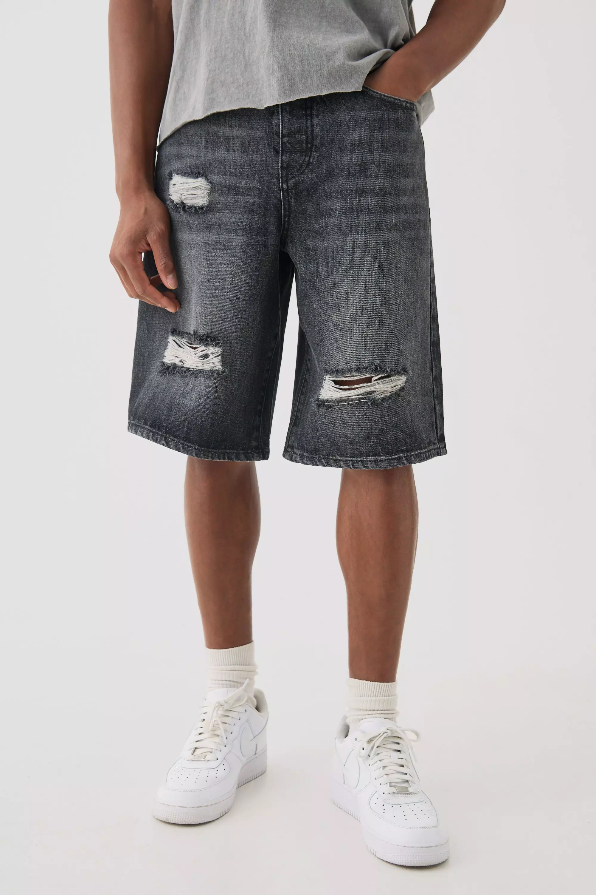 Black Knee Rip Denim Jorts In Washed Black