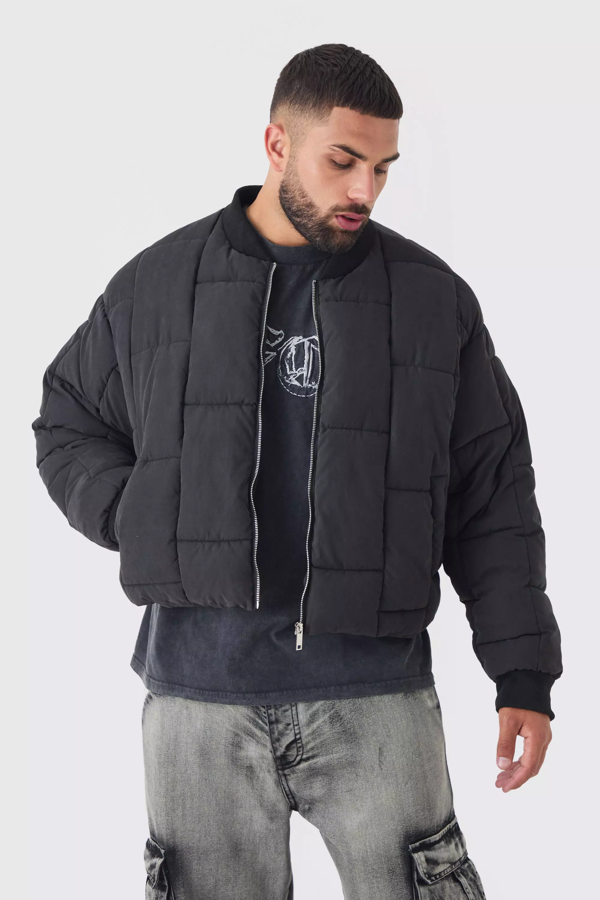 Plus kastige gesteppte Bomberjacke, Black alternatives Bild