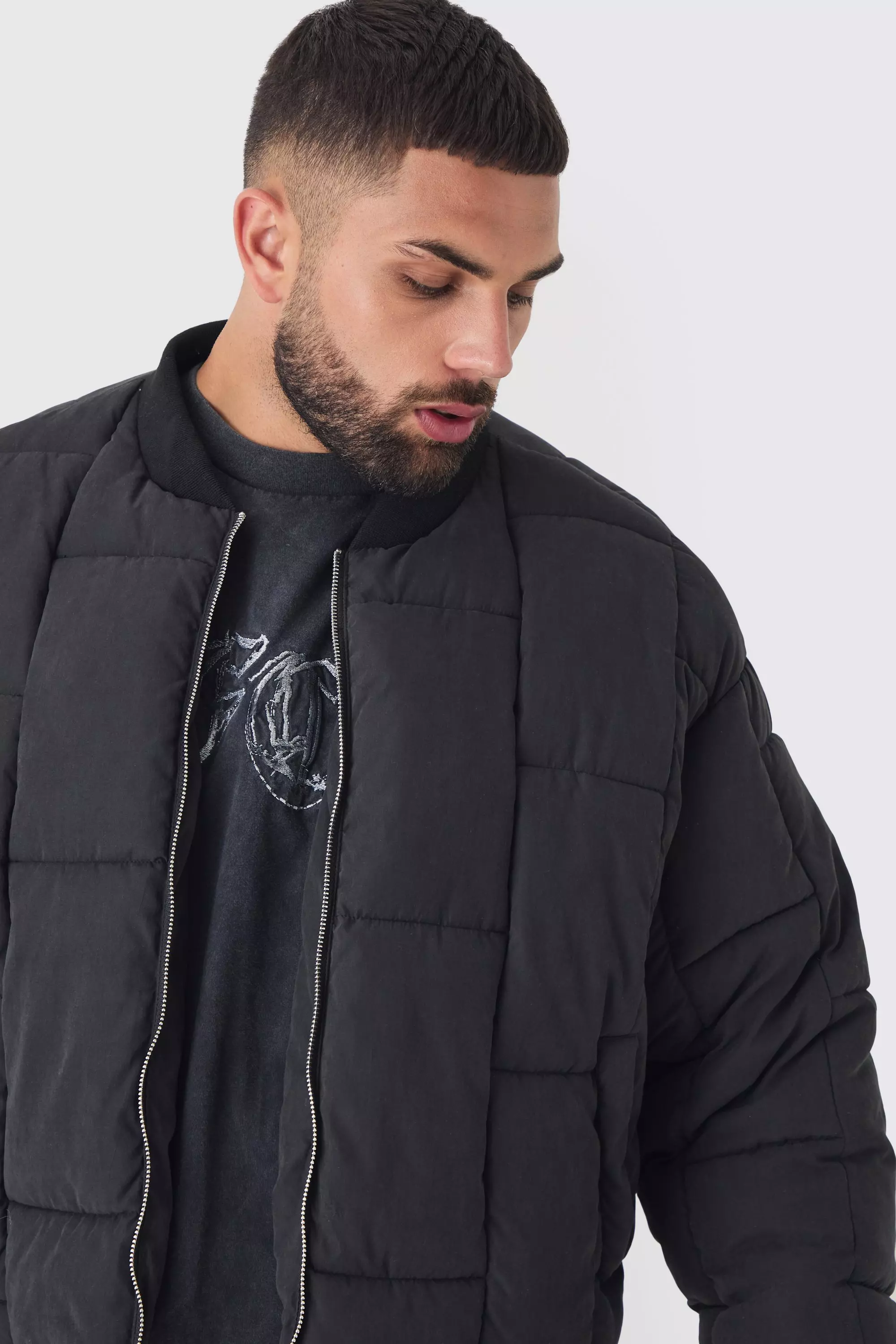 Plus kastige gesteppte Bomberjacke, Black alternatives Bild