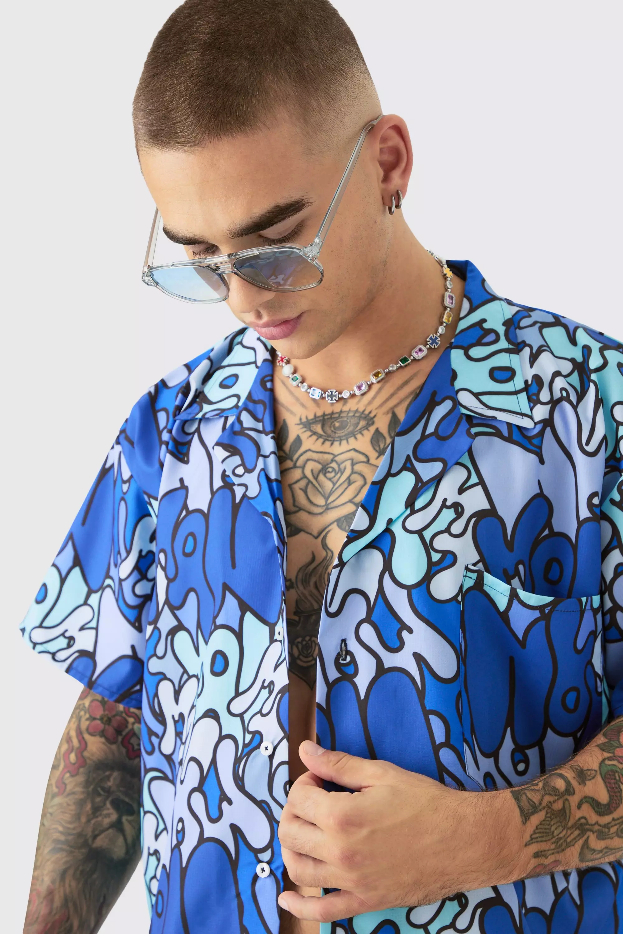 【boohoo】BOXY RIPSTOP GRAFFITI SHIRT & MID SWIM SHORT SET Boxy Ripstop Graffiti Shirt & Mid Swim Short Set | boohooMAN UK