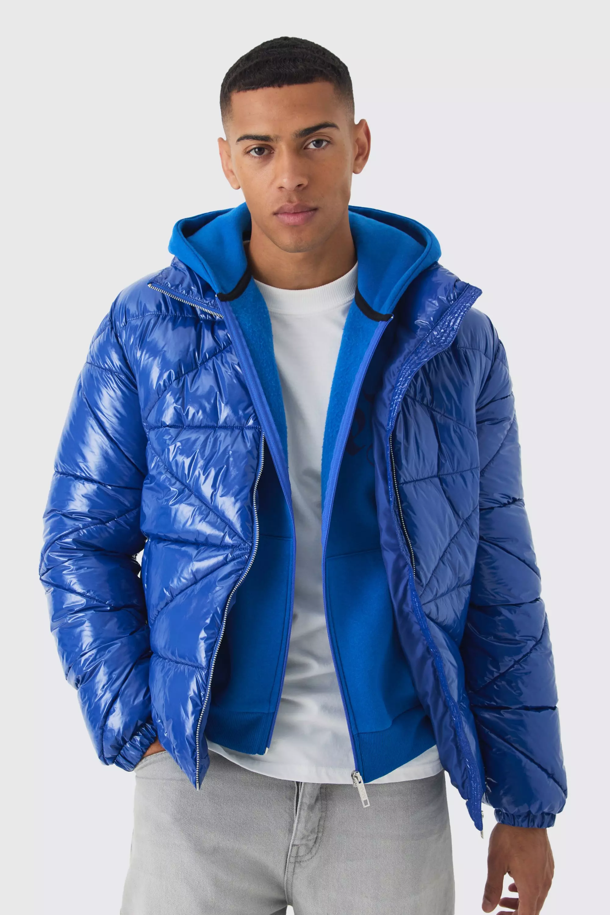 Blue vinyl puffer jacket on sale