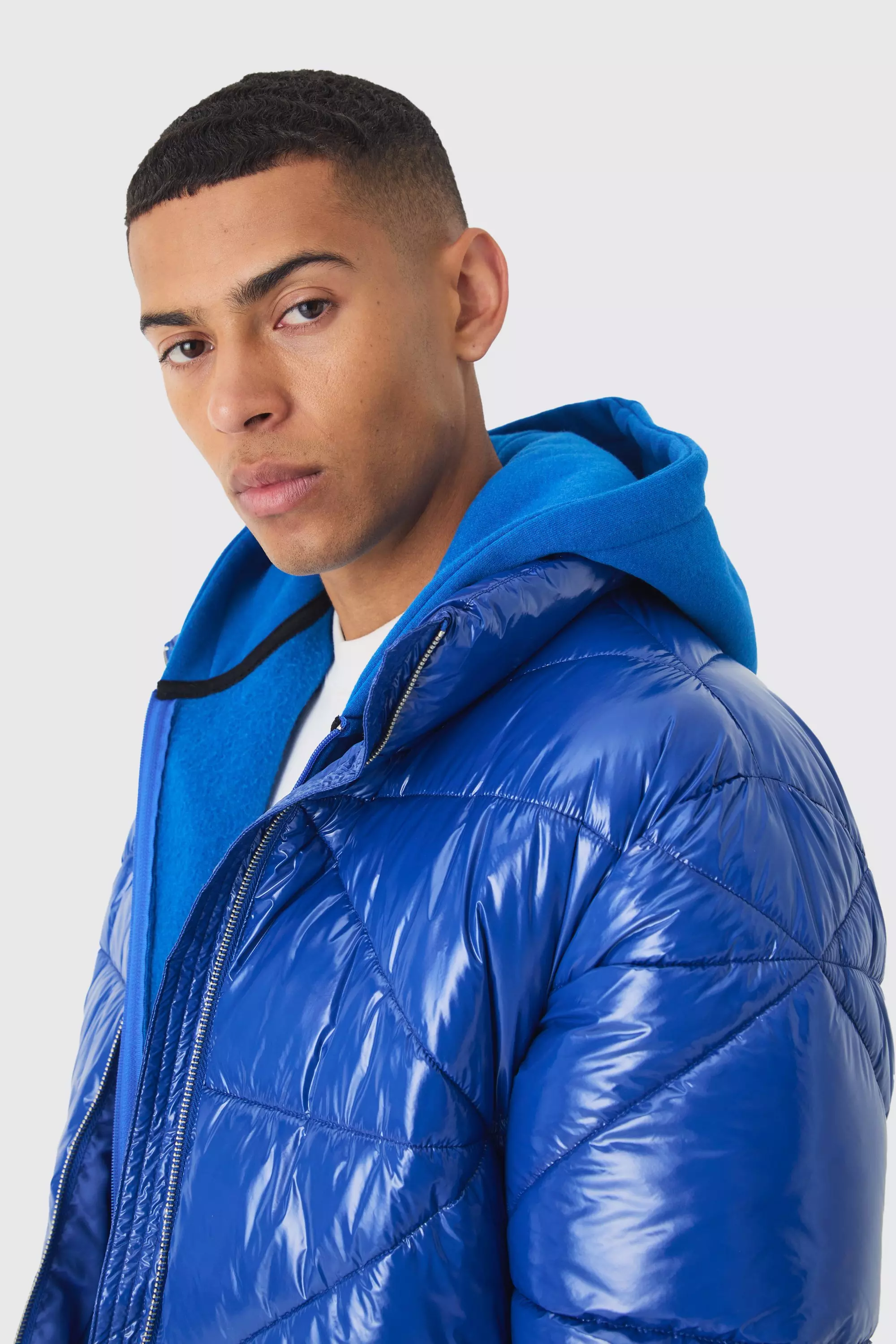 Quilted High Shine Vinyl Funnel Neck Puffer In Blue boohooMAN UK