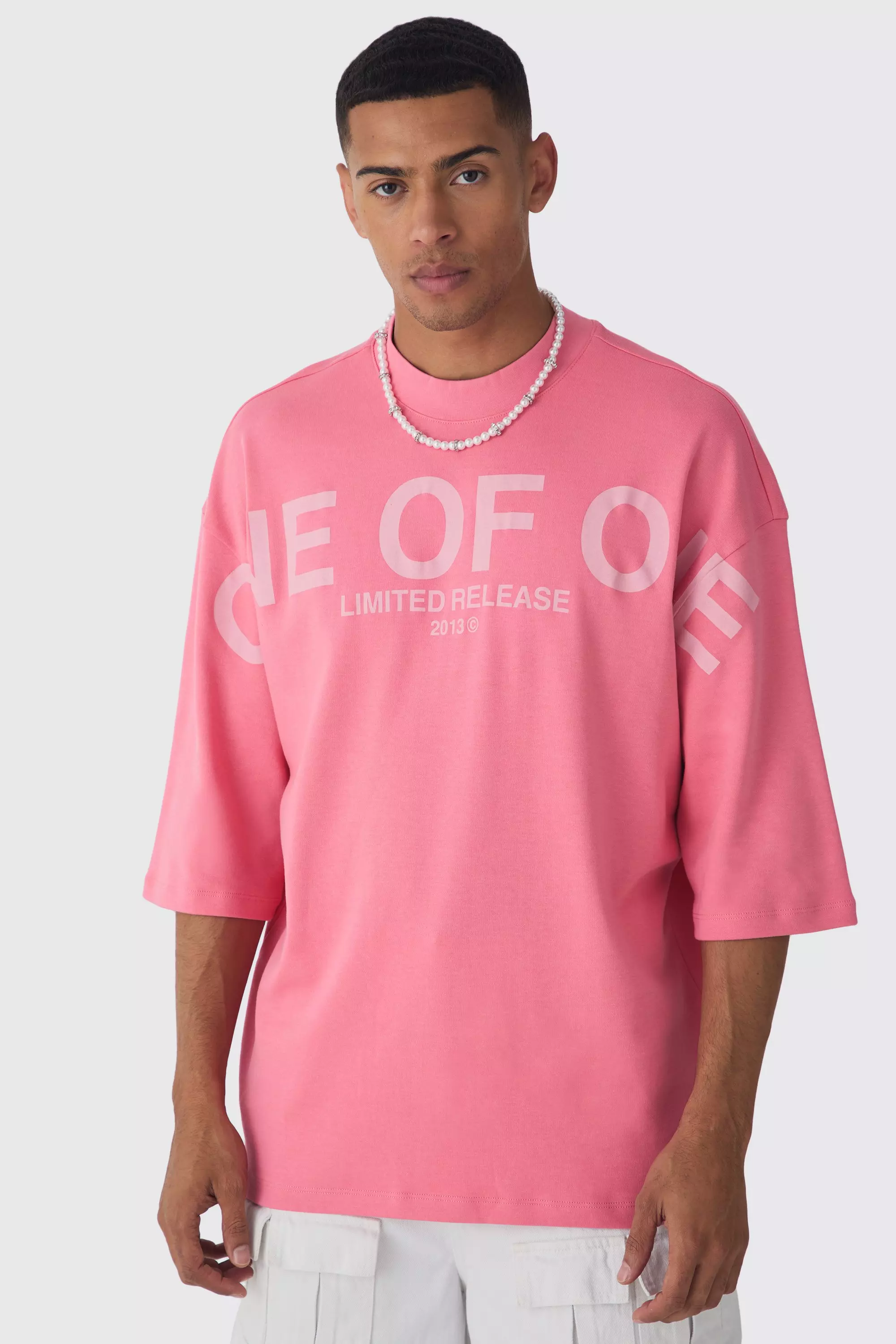 Pink Oversized Extended Neck Interlock Graphic T-shirt