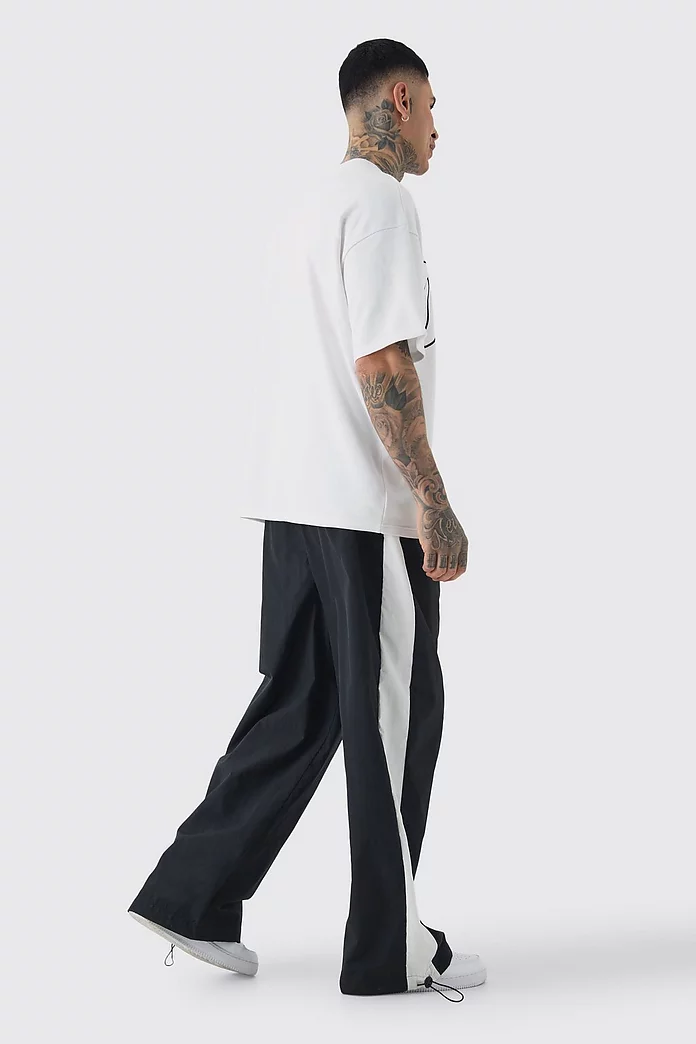 Tall Side Panel Track Pants in Black | boohooMAN USA Tall Side Panel Track Pants in Black | boohooMAN USA