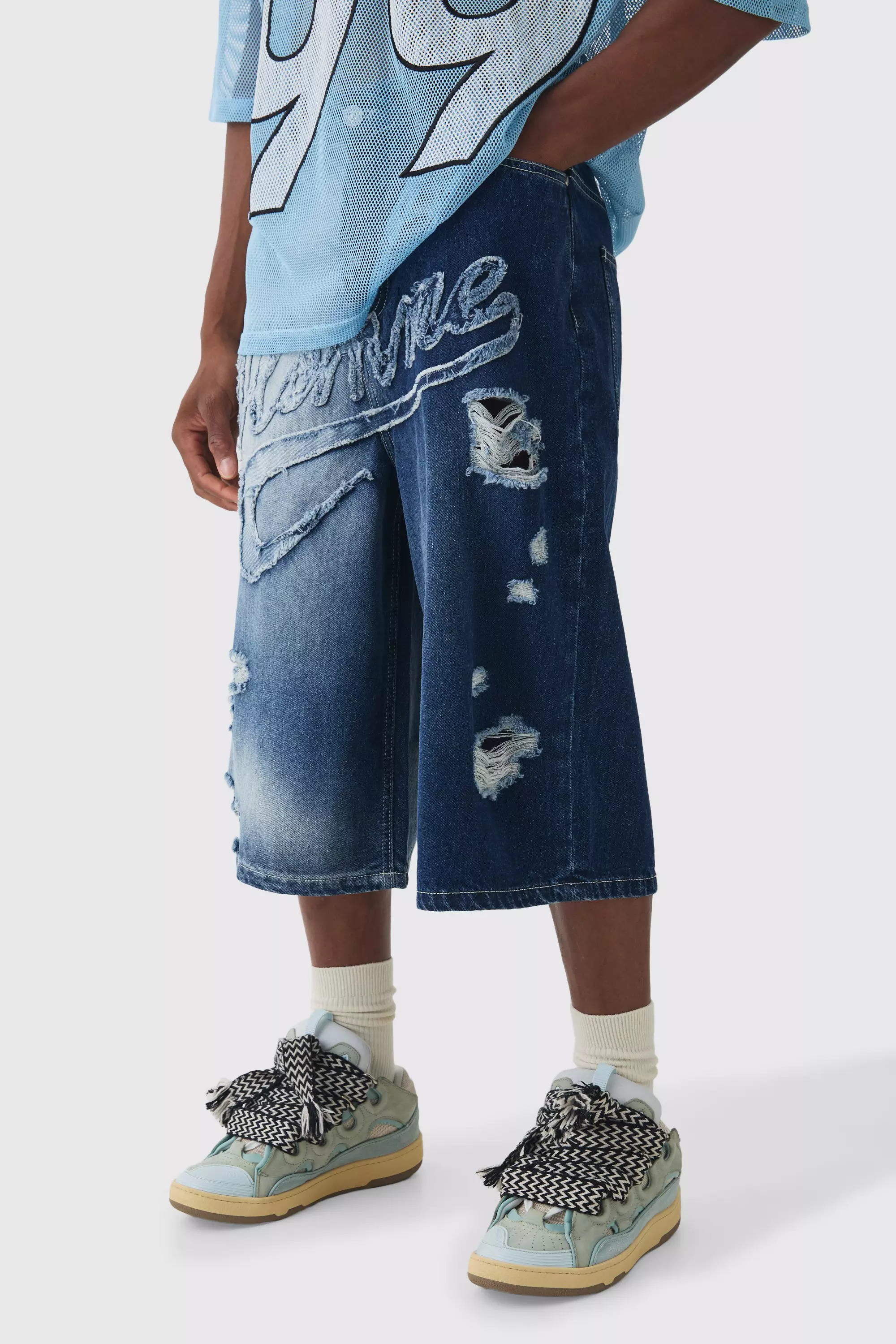 Blue Longline Homme Spliced Ripped Applique Denim Jorts In Blue