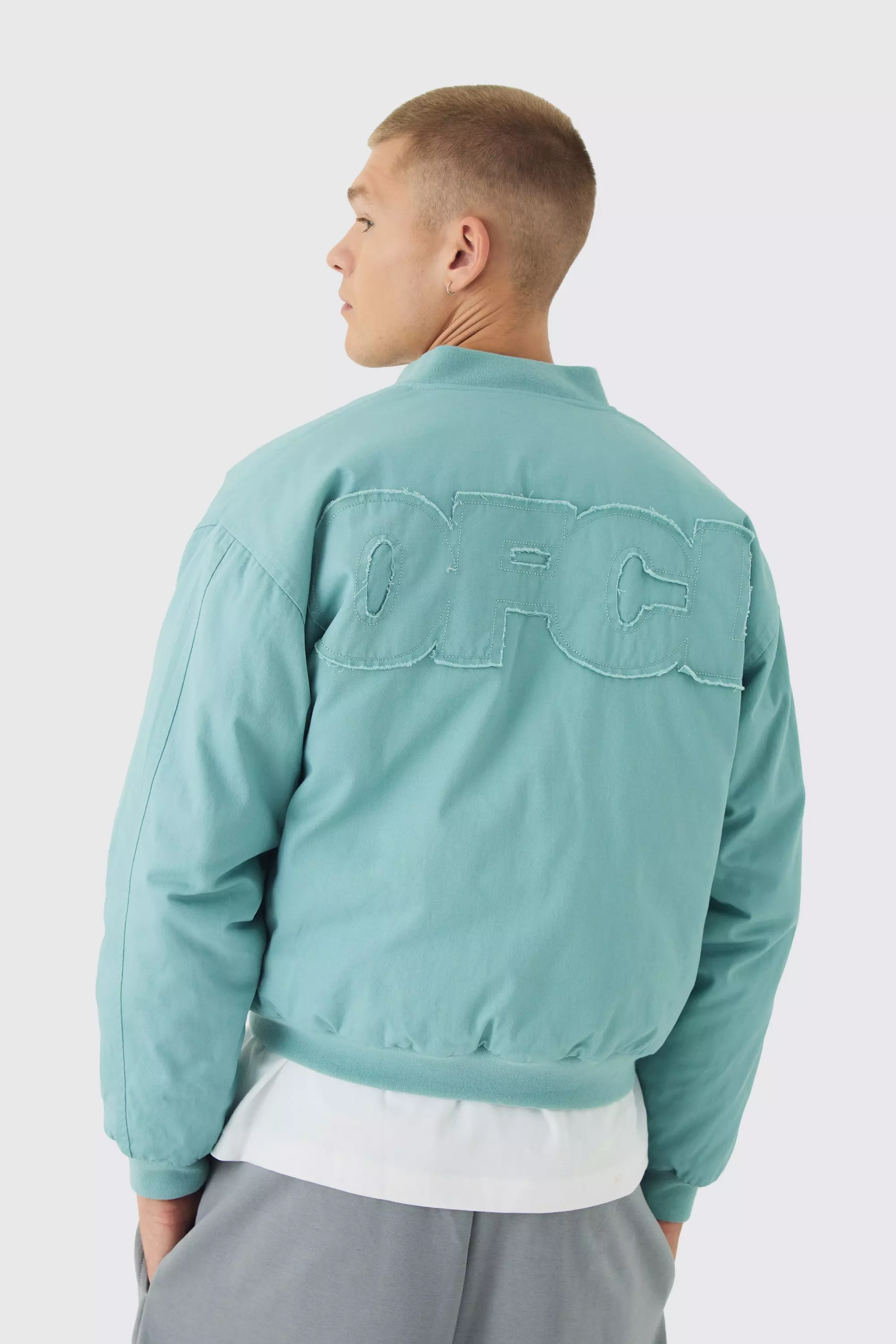 Blue Boxy OFCL Applique Twill Padded Bomber Jacket In Light Blue