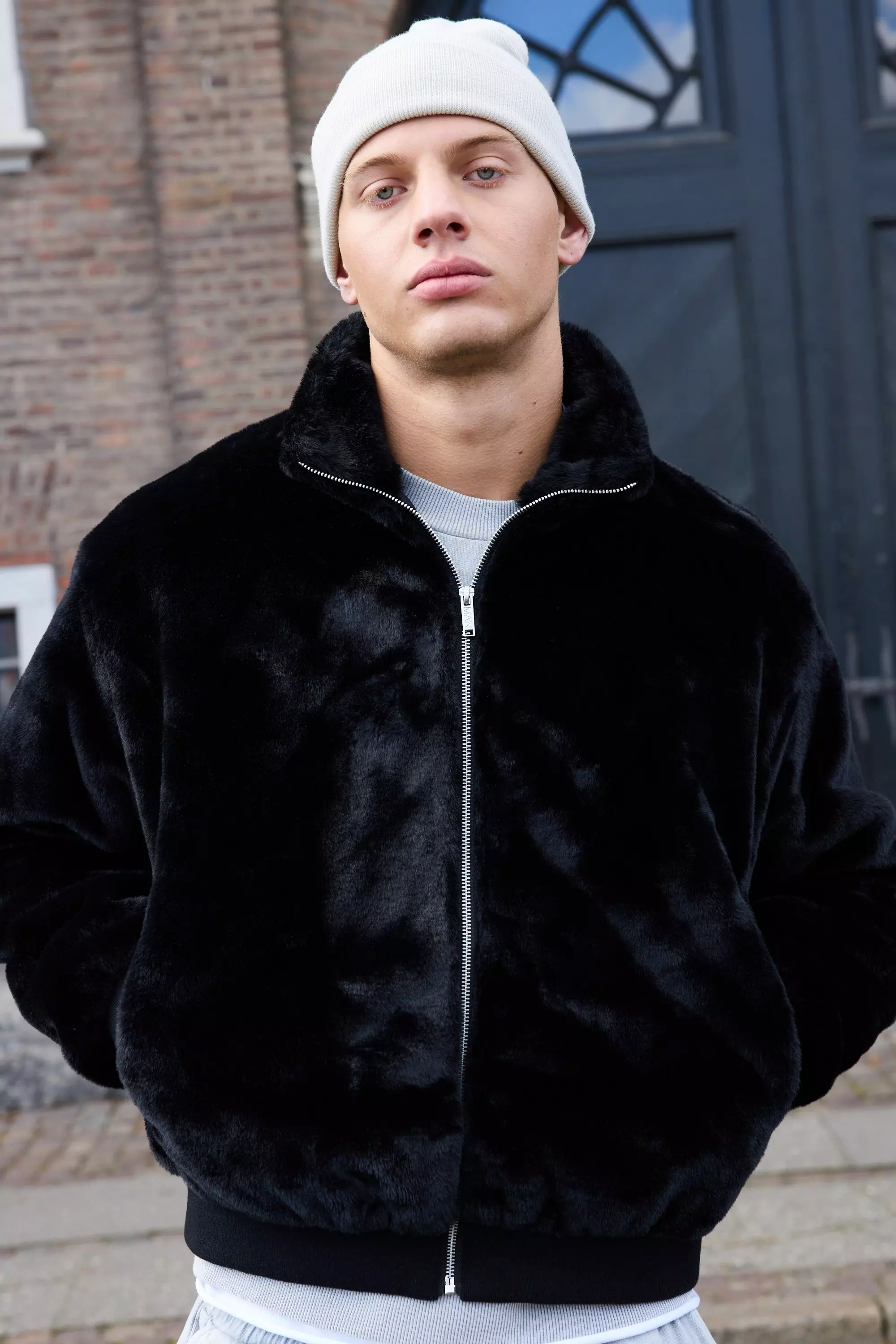 Black Faux Fur Funnel Neck Bomber Jacket In Black